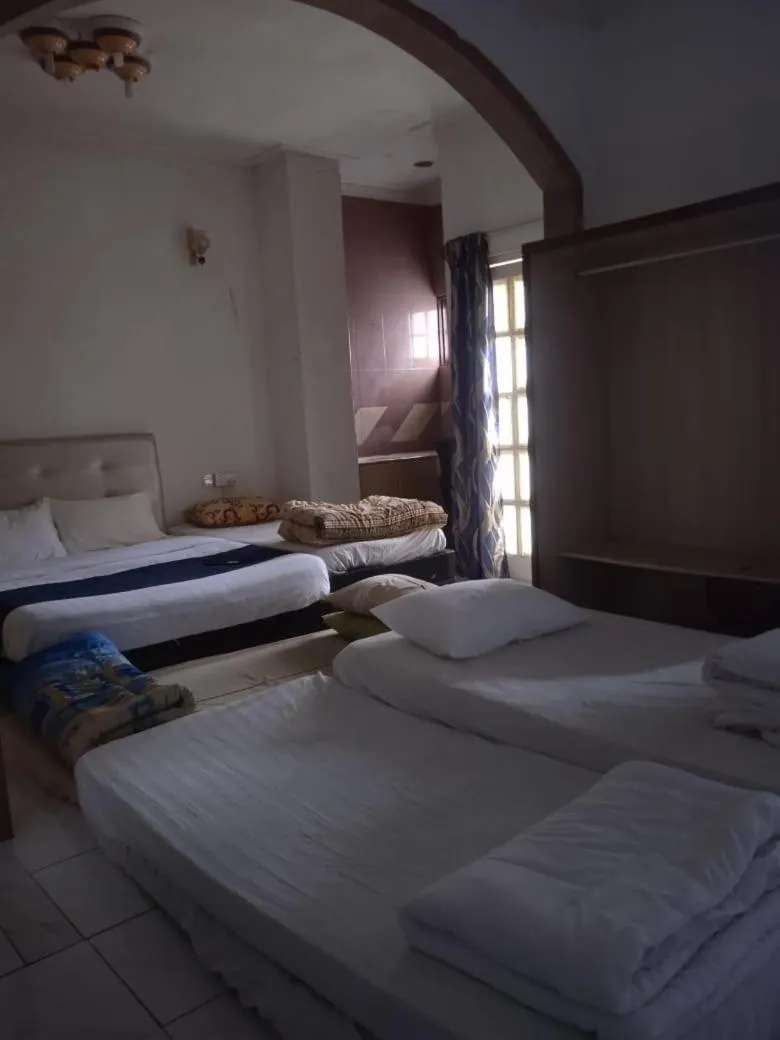 Bed in Cool view budget hotel