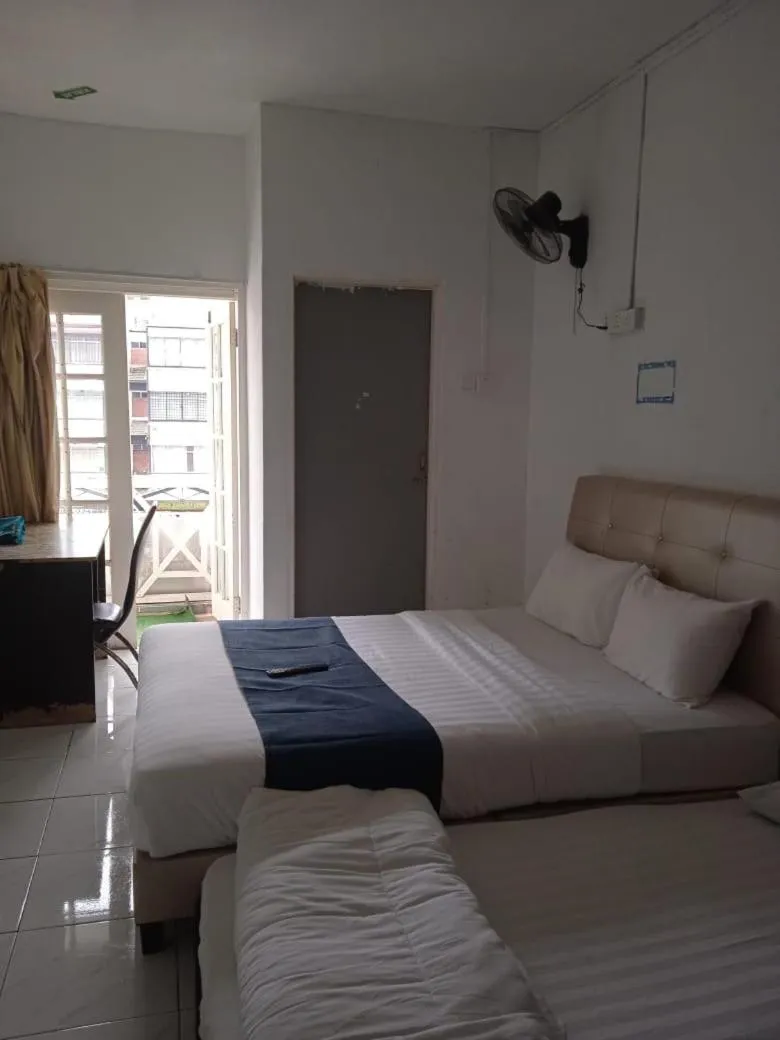 Bed in Cool view budget hotel