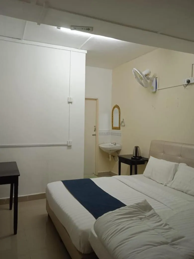 Bed in Cool view budget hotel