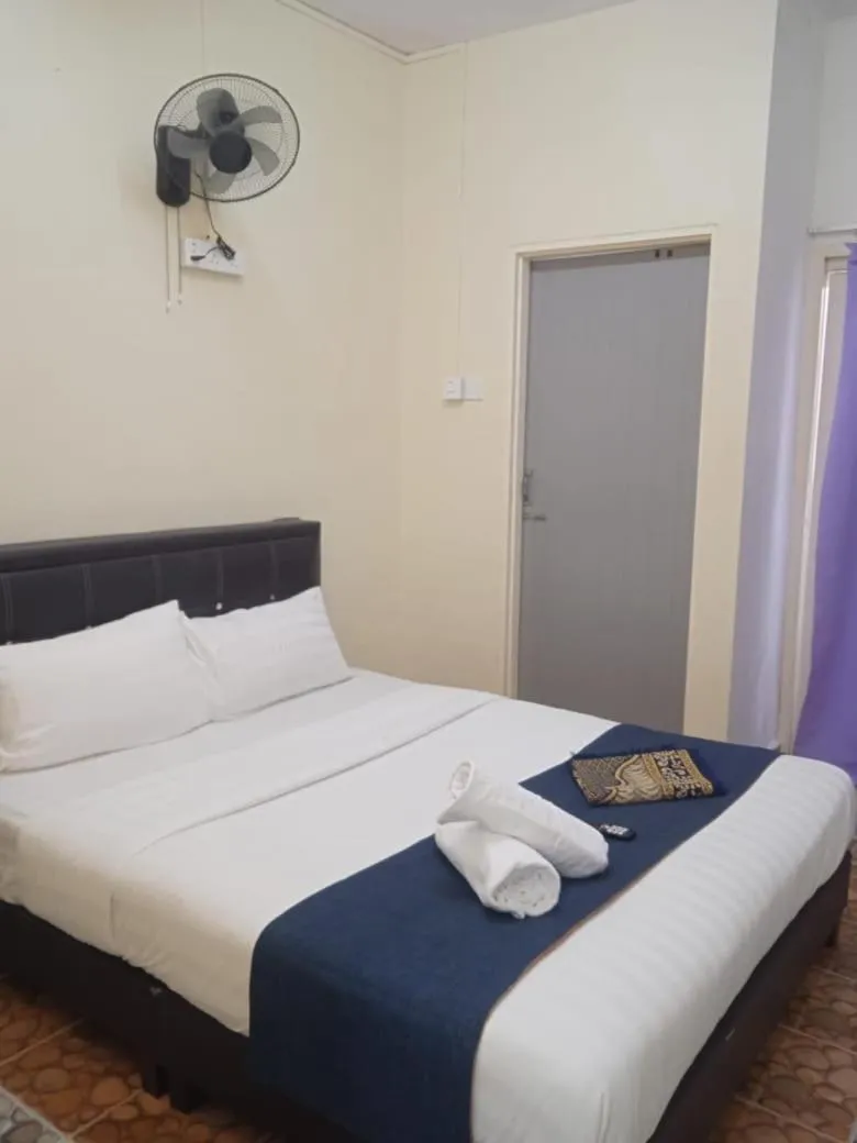 Bed in Cool view budget hotel