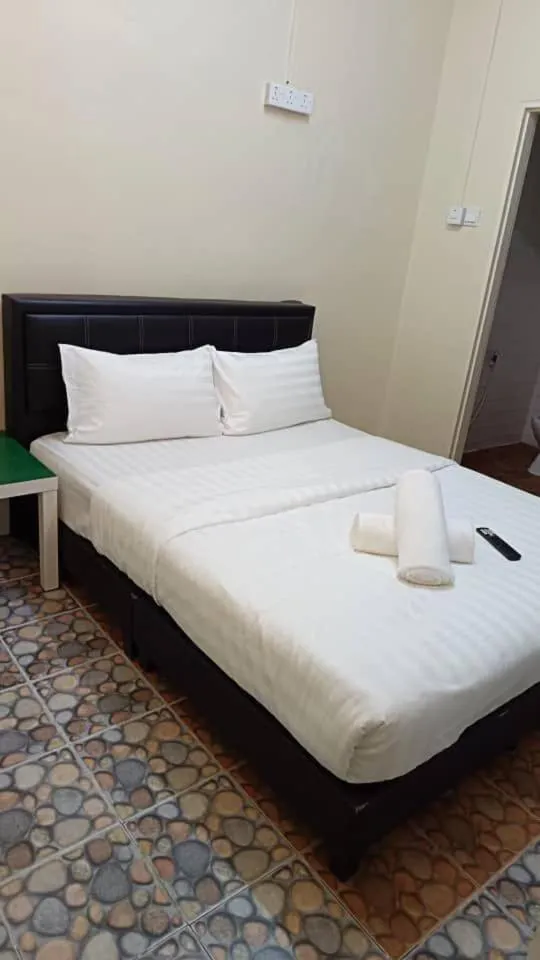 Bed in Cool view budget hotel