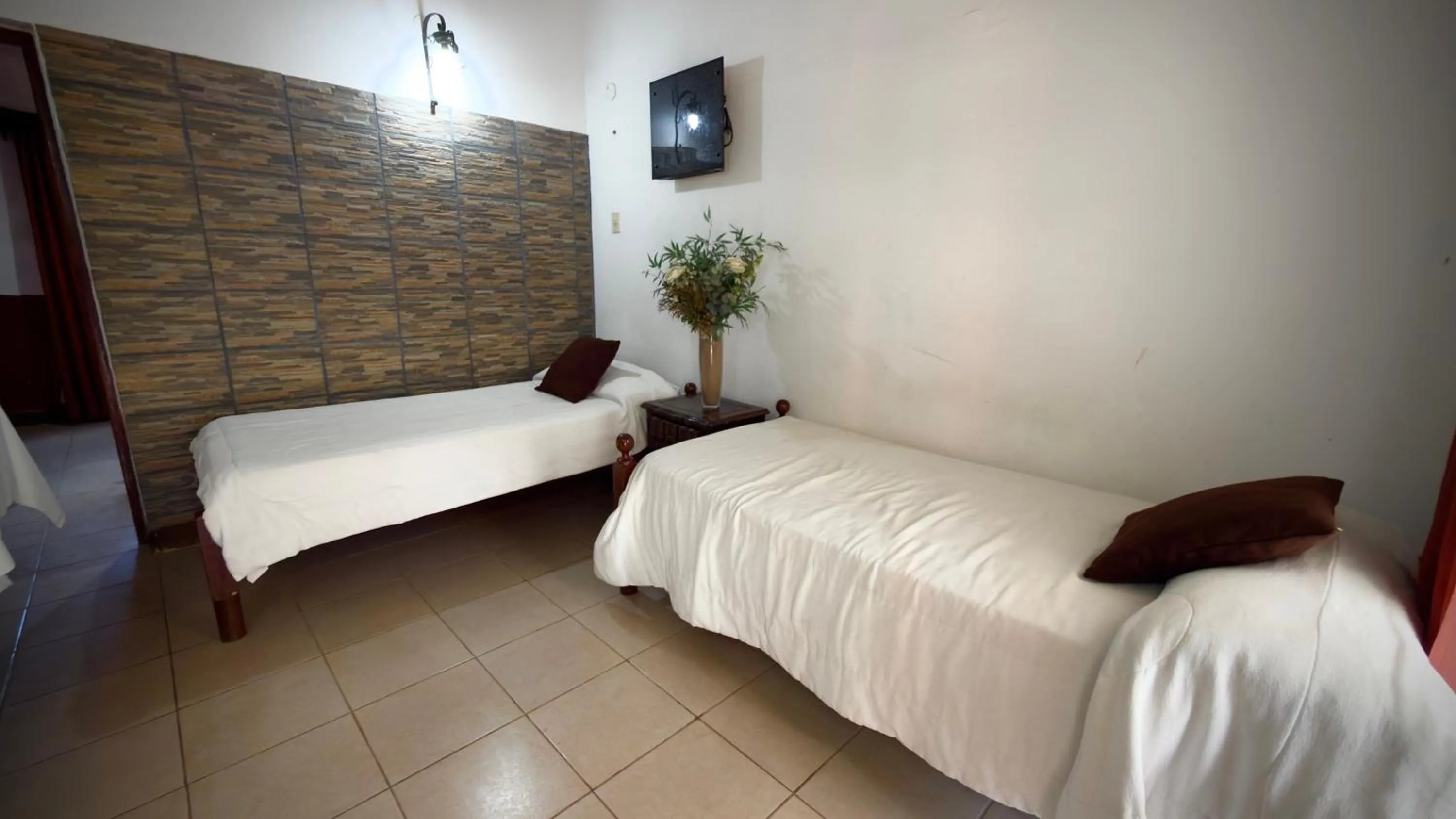 Bed in La Casa de Reyes Posada