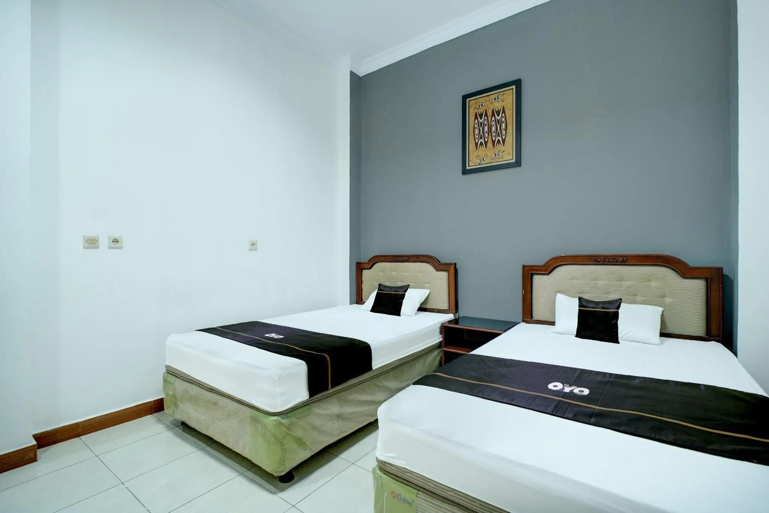 Photo of the whole room, Bed in Hotel O Depok near Bhayangkara BRIMOB Hospital Formerly Hotel Mutiara Kelapa Dua Depok