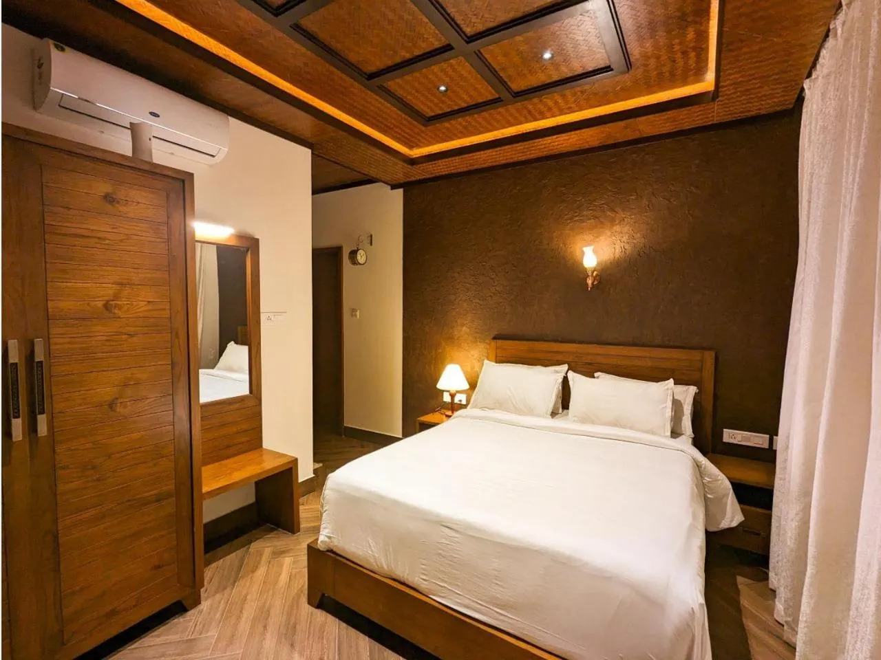 Bed in Talenresort Vythiri Villas