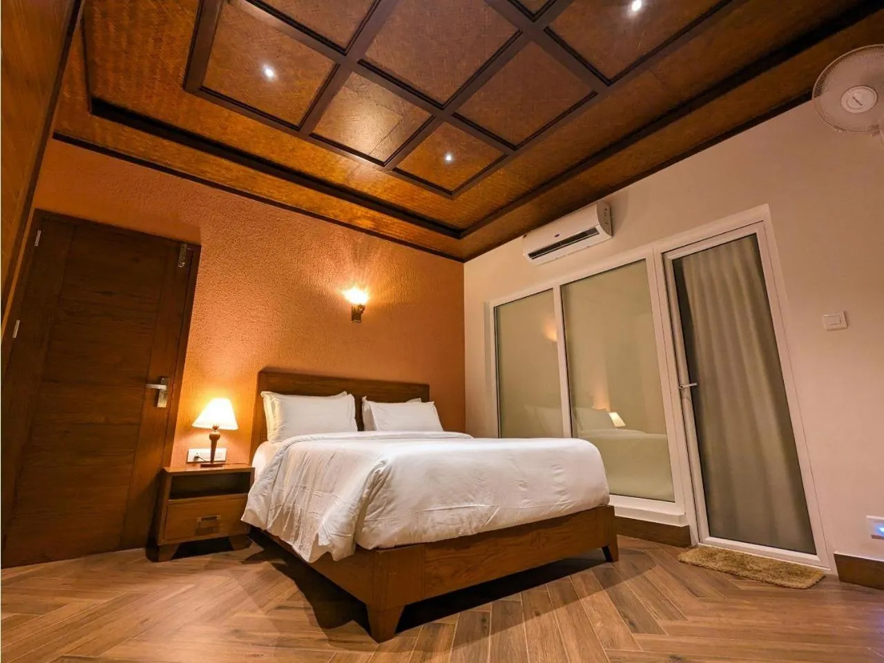Bed in Talenresort Vythiri Villas