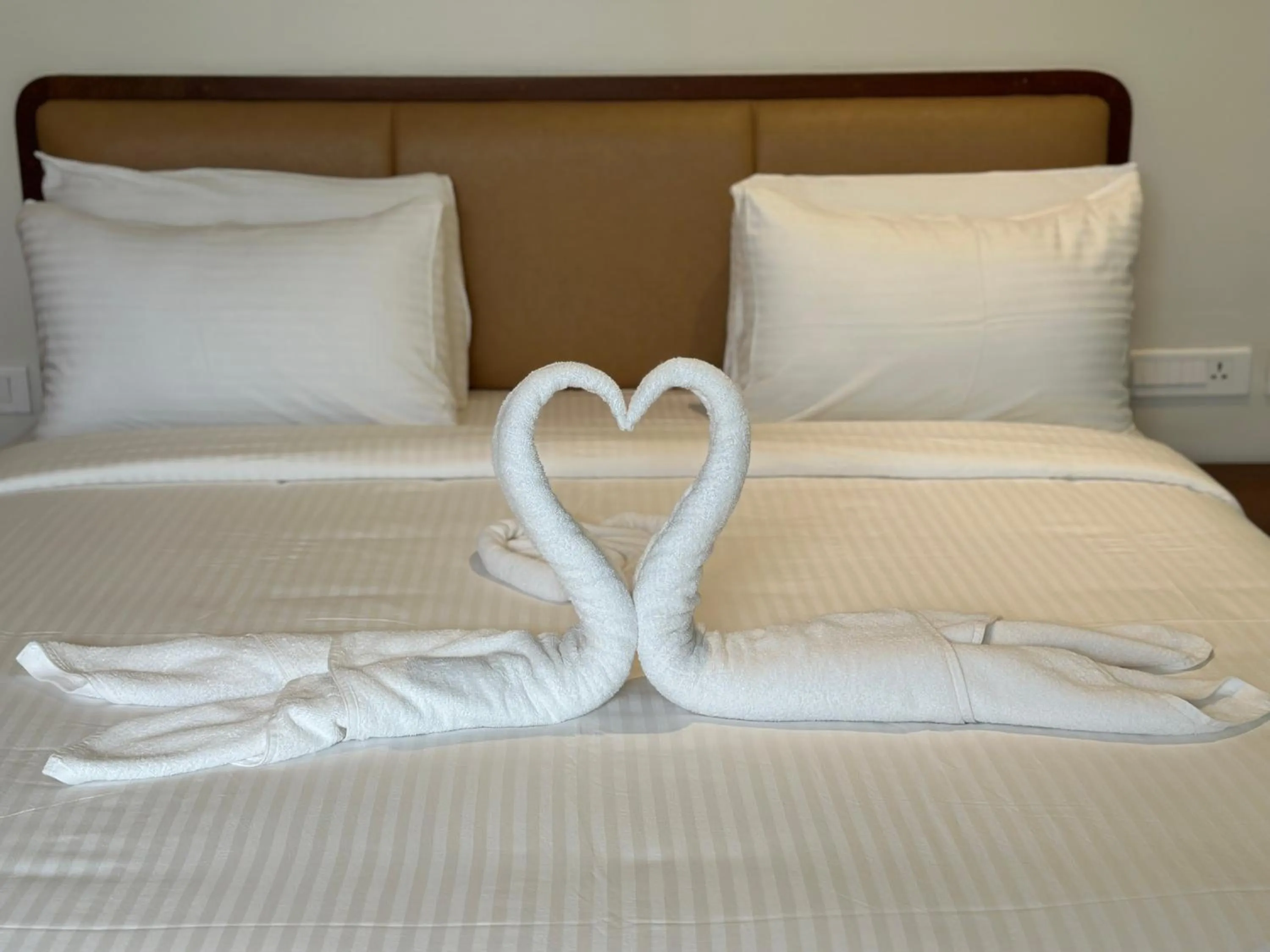 Bed in Talenresort Vythiri Villas