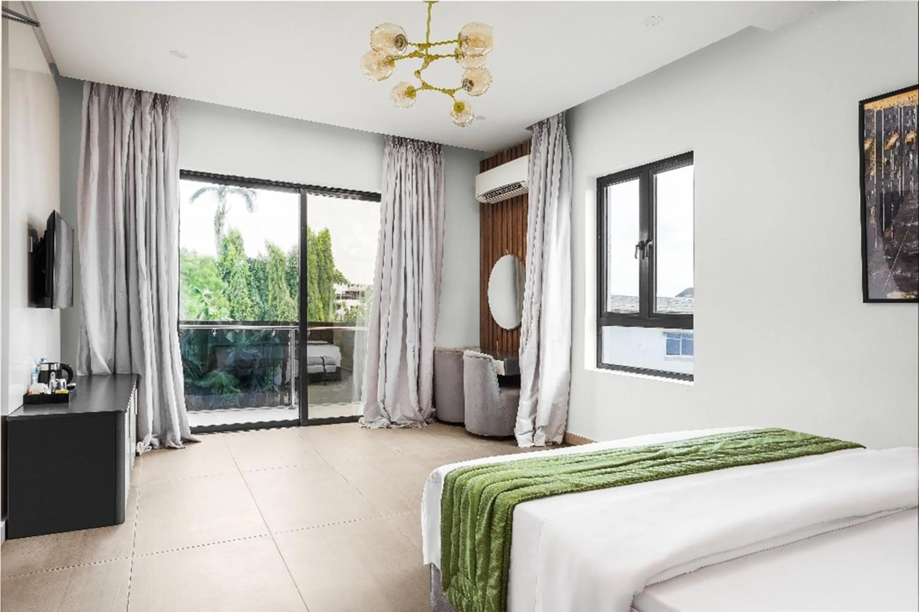 Bed in Vertus Hotel and Suites