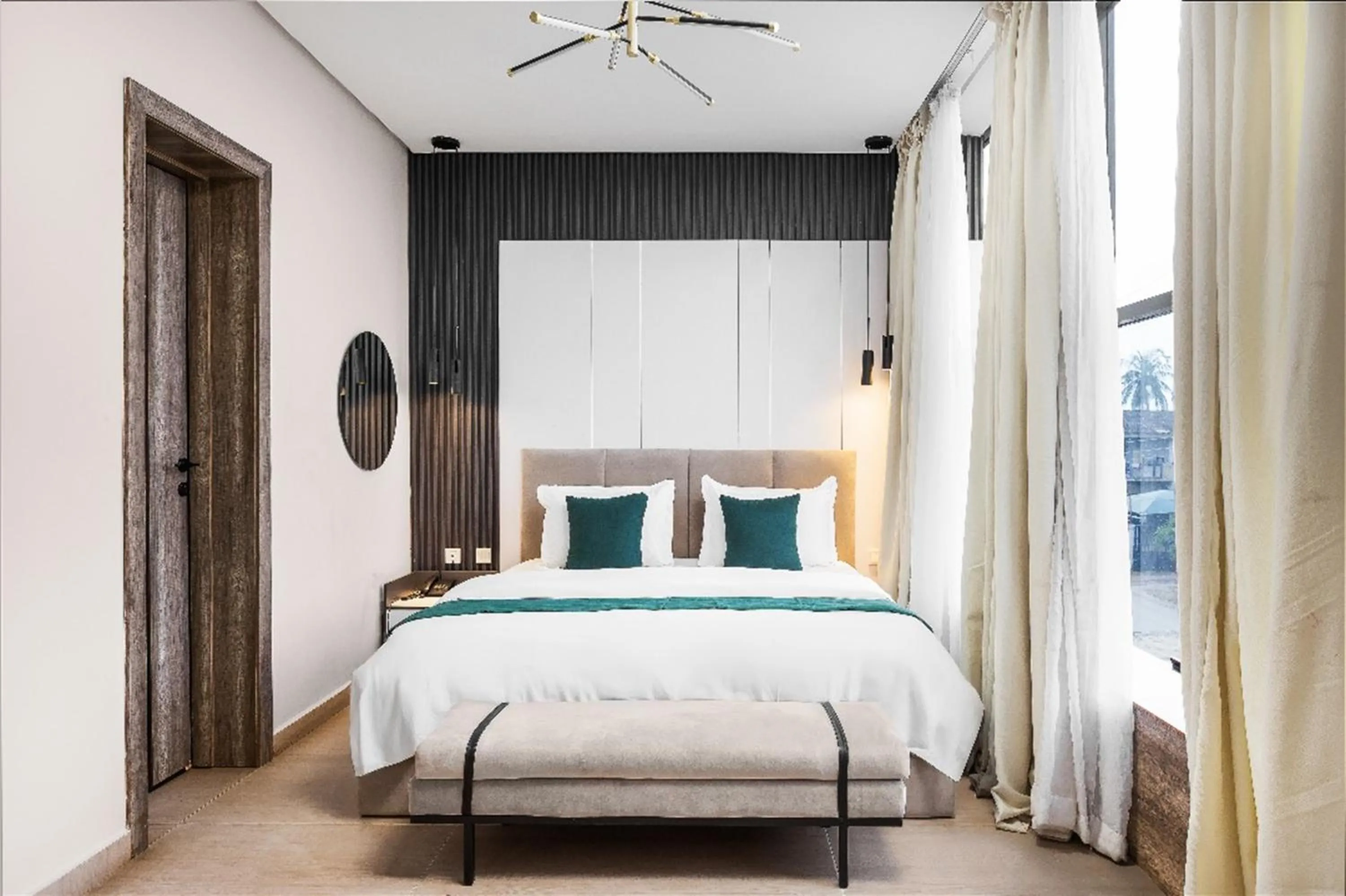 Bed in Vertus Hotel and Suites