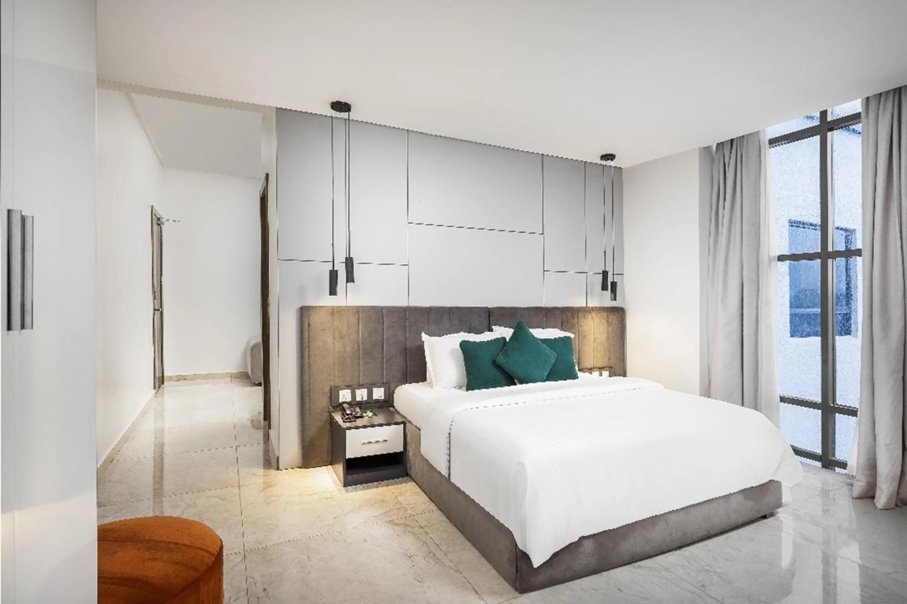 Bed in Vertus Hotel and Suites