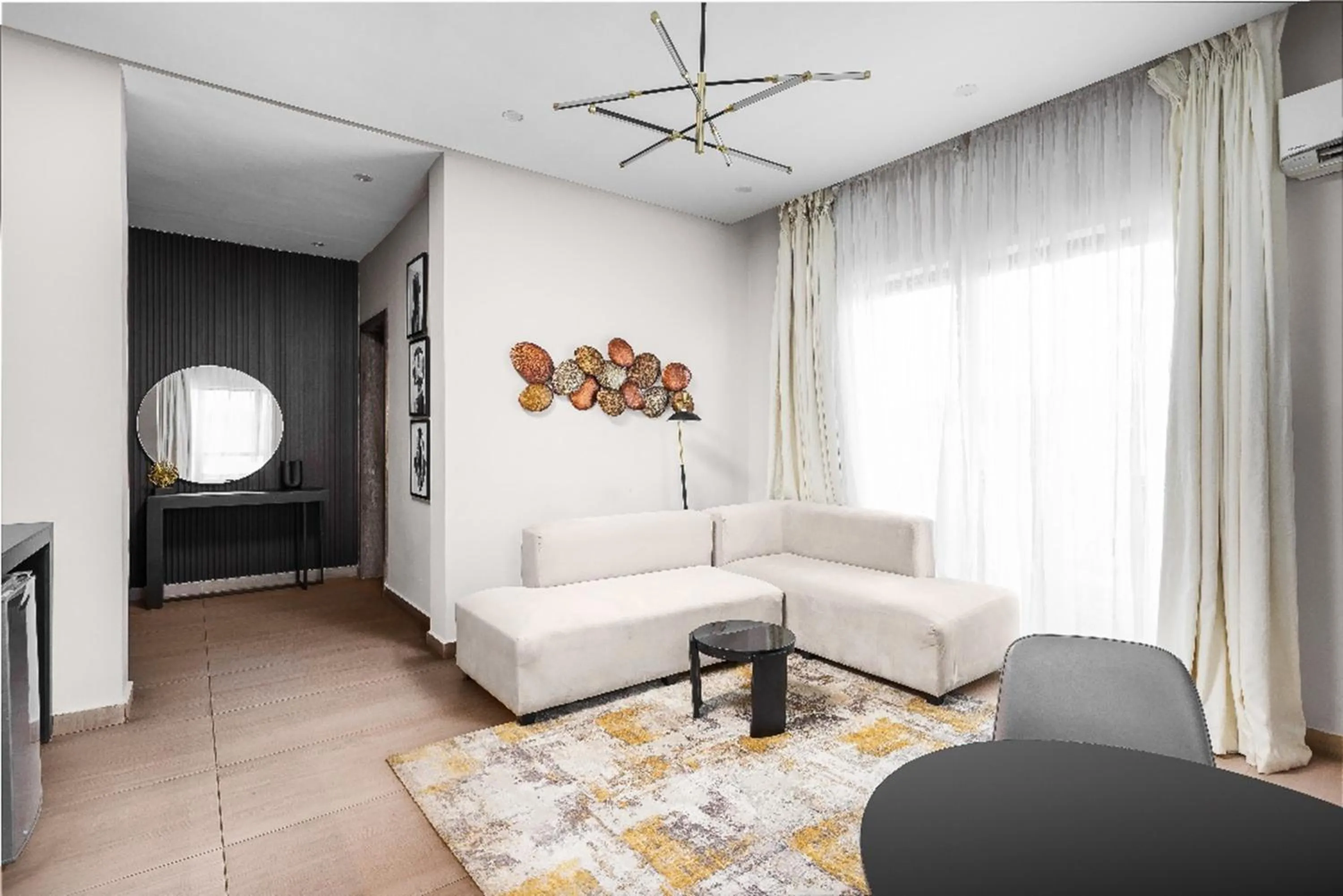 Living room in Vertus Hotel and Suites