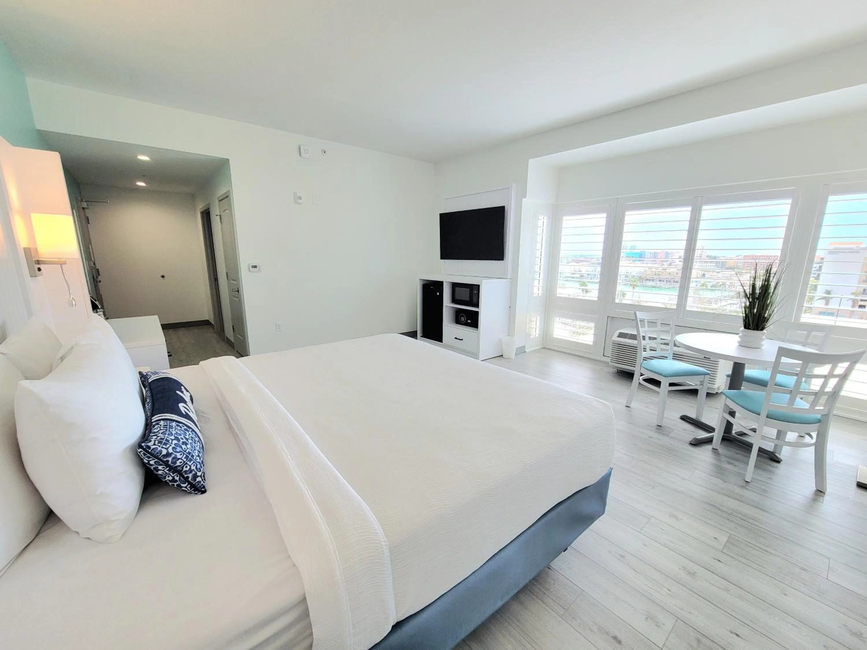 Bed in ChartHouse Clearwater Beach Marina Hotel