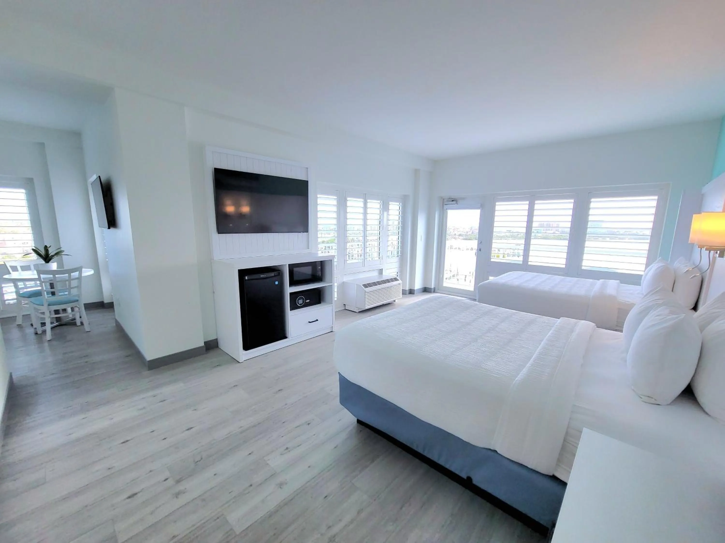 Bed in ChartHouse Clearwater Beach Marina Hotel