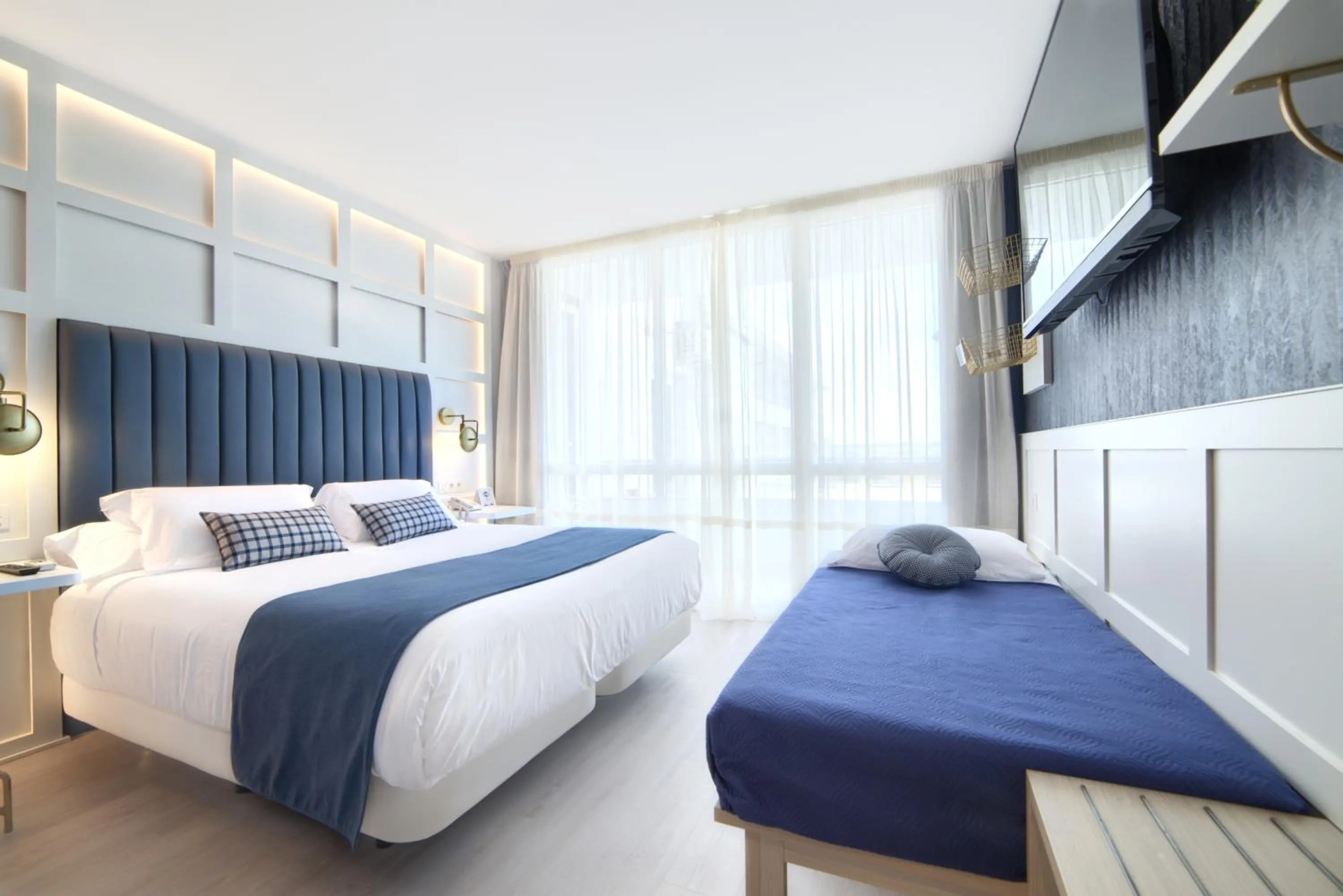 Bed in Hotel Luze El Villa