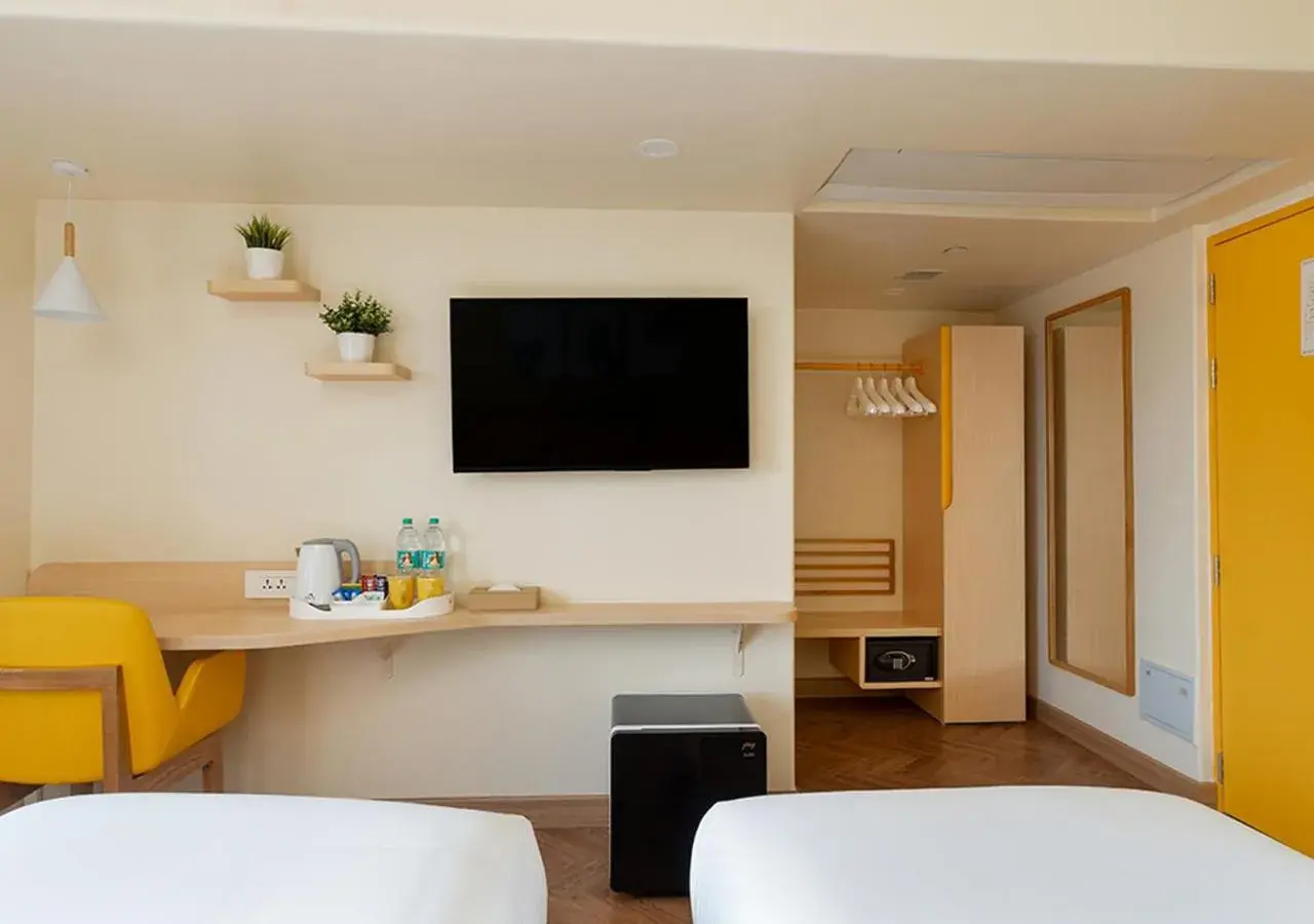 Standard Twin Room - single occupancy in Bloom Hub l WEH Andheri Standard Twin Room - single occupancy in Bloom Hub l WEH Andheri