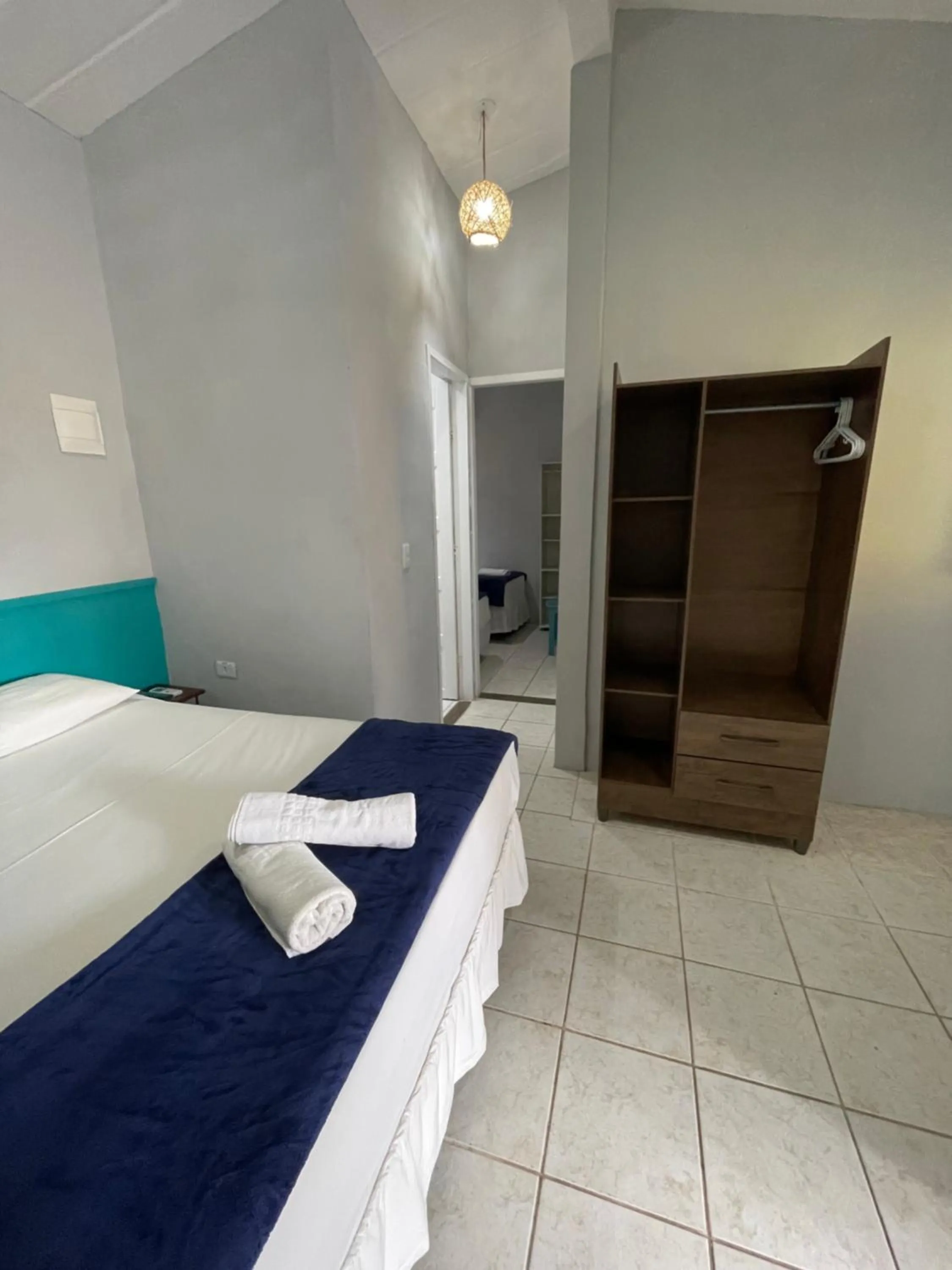 Bed in Pousada Girassol