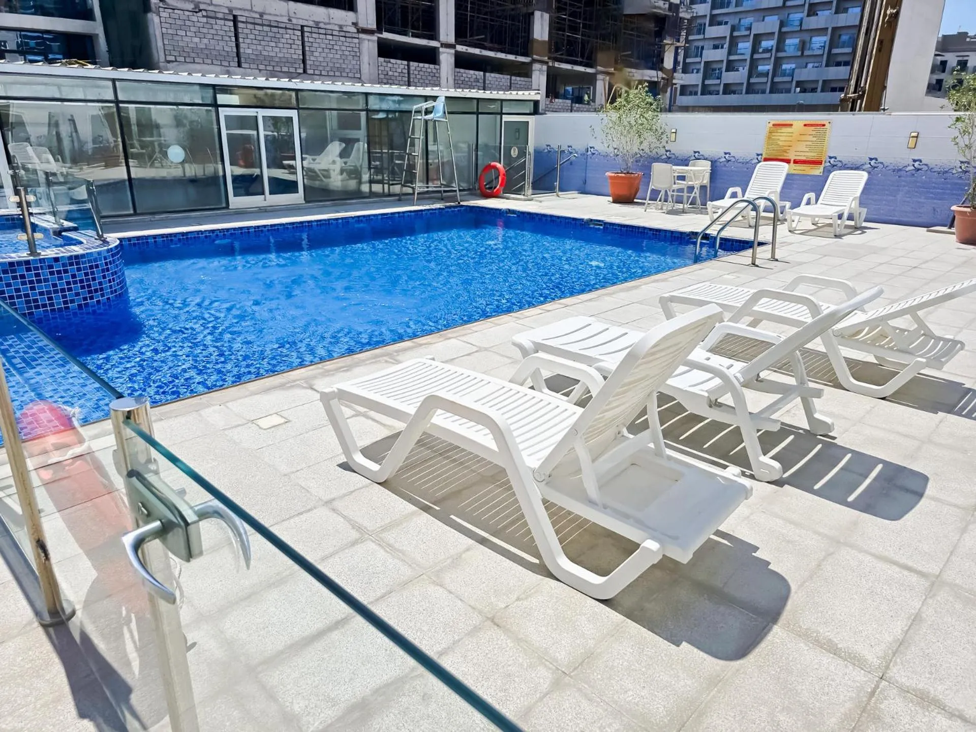 Swimming pool in MK Residence JVC