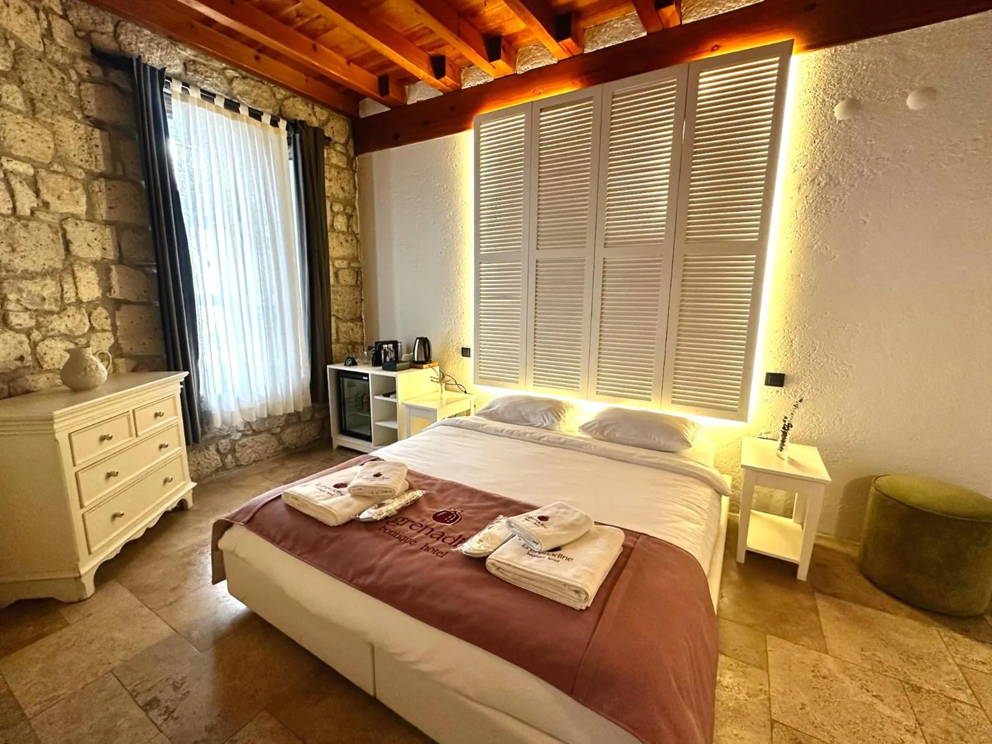 Bed in La Grenadine Hotel