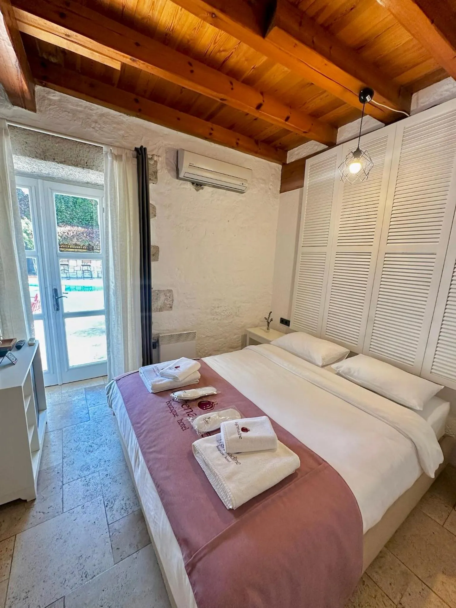 Bed in La Grenadine Hotel