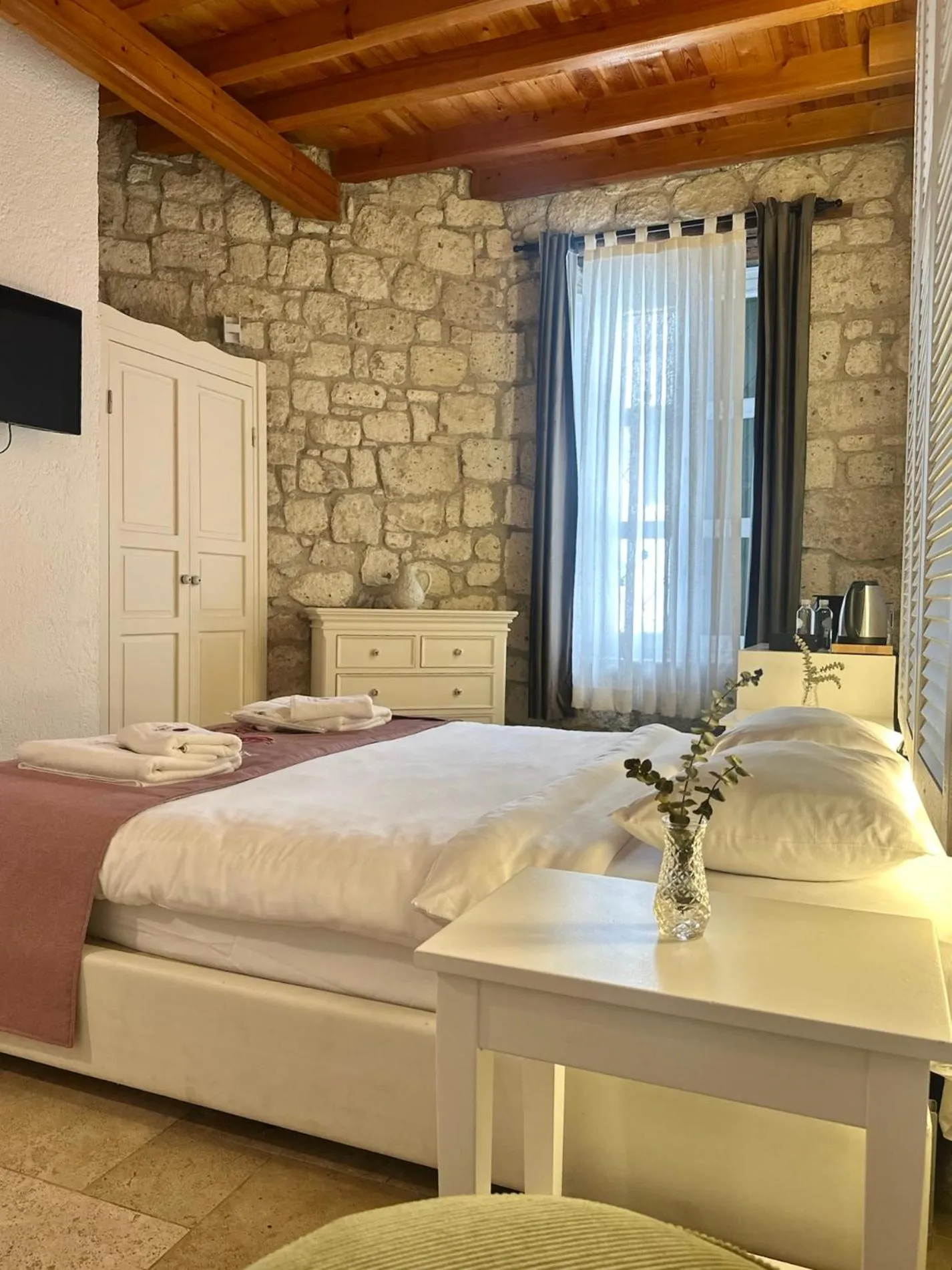 Bed in La Grenadine Hotel