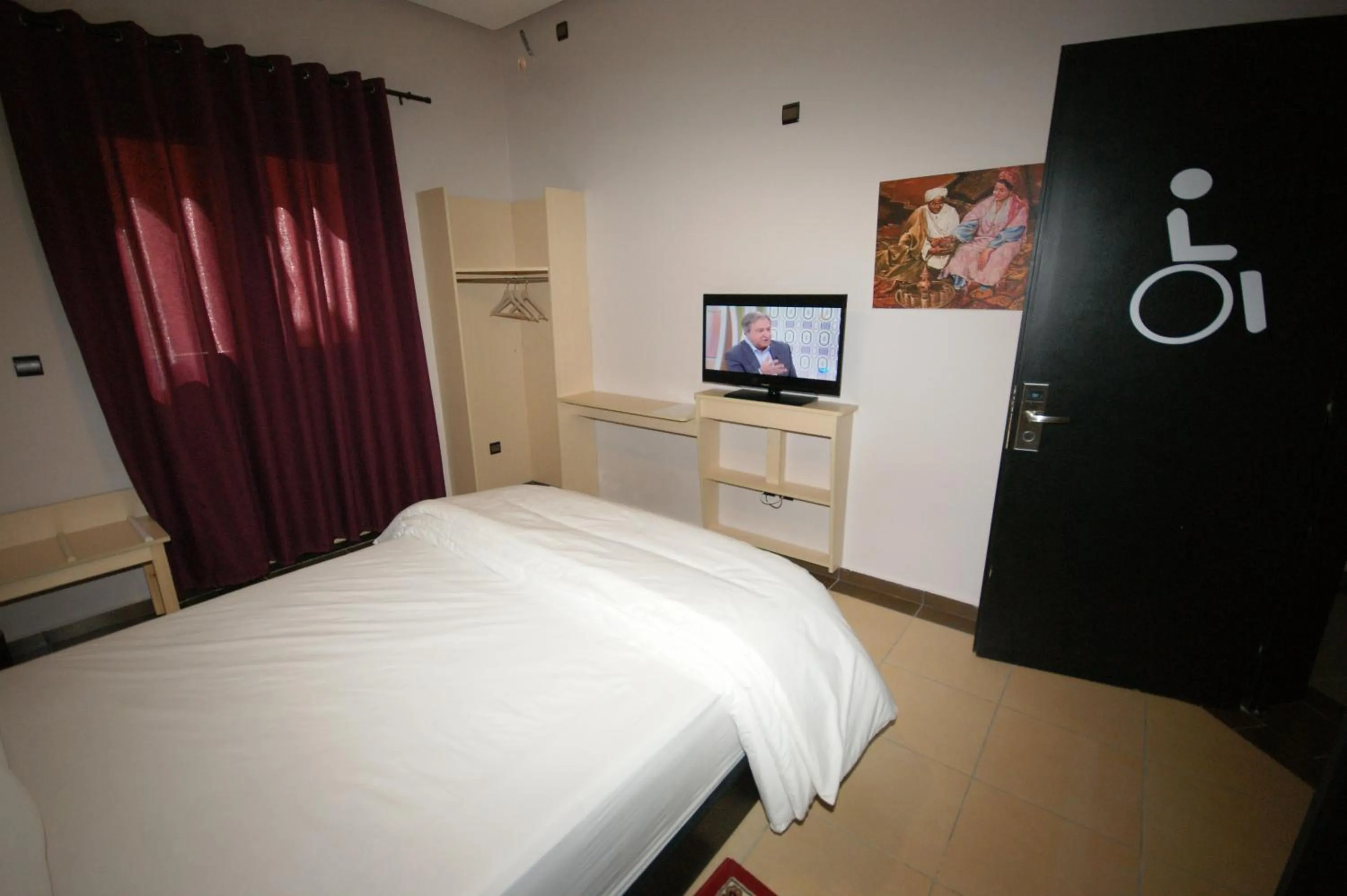 TV and multimedia, Bed in INOU Hotel Aourir