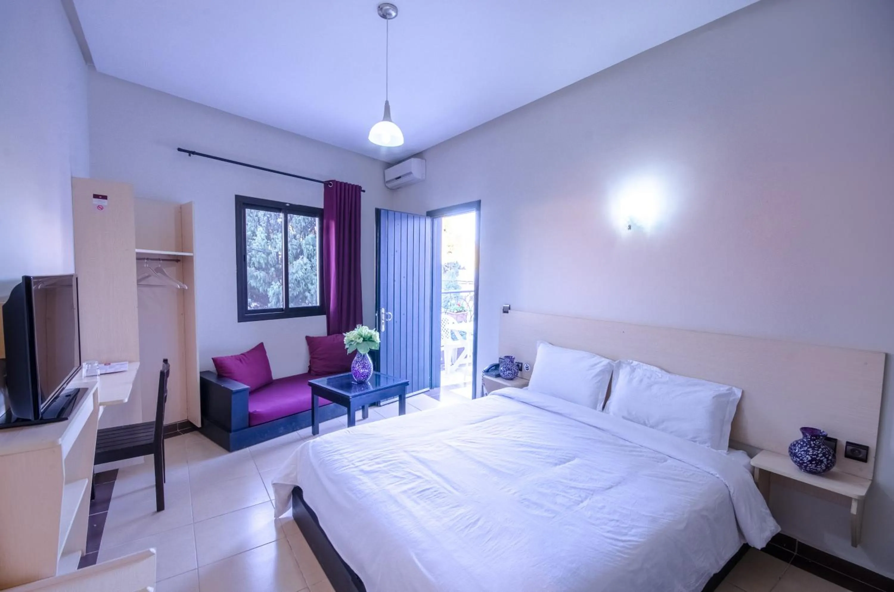 Photo of the whole room, Bed in INOU Hotel Aourir