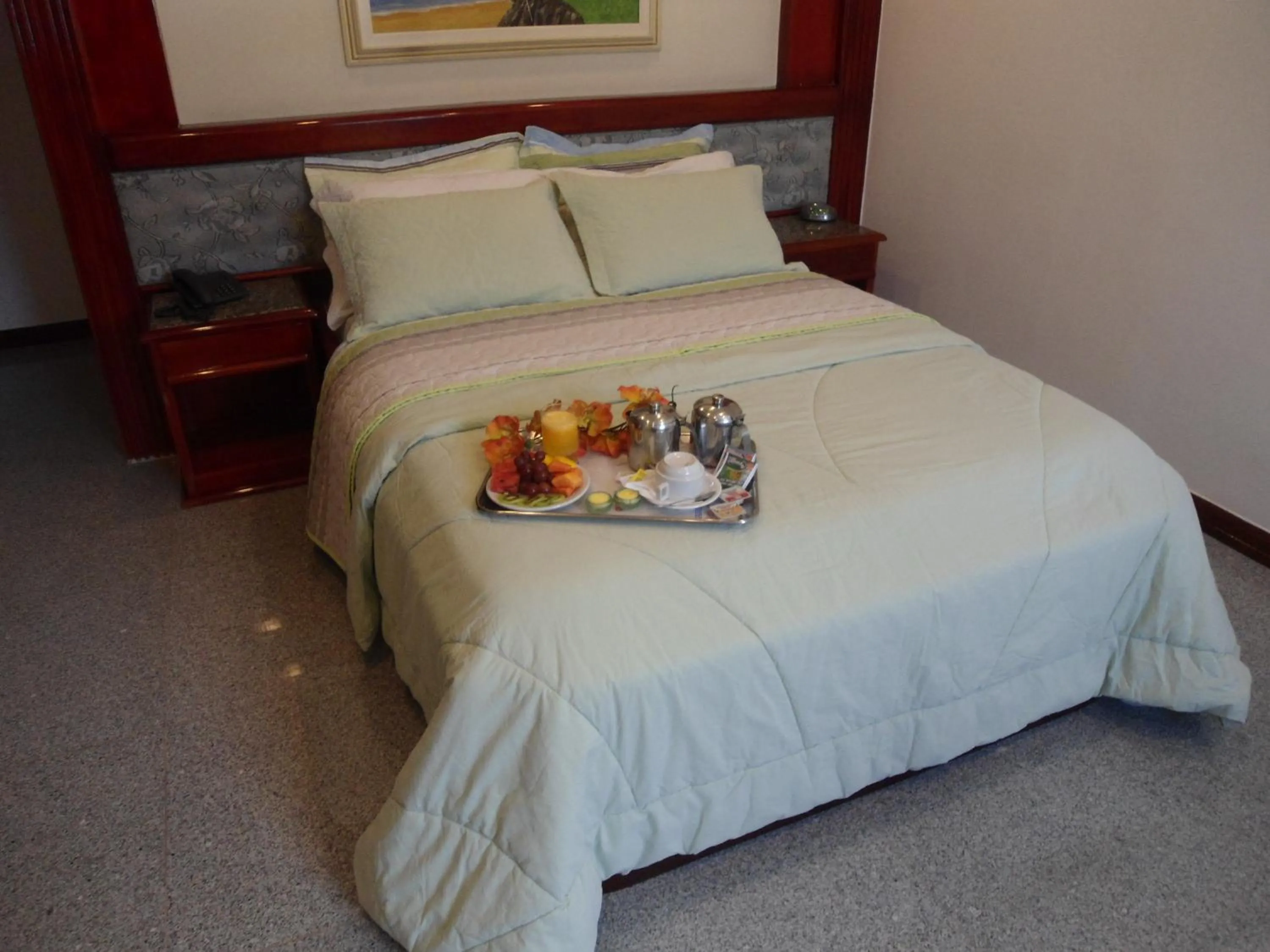 Bed in Maxim Plaza Hotel