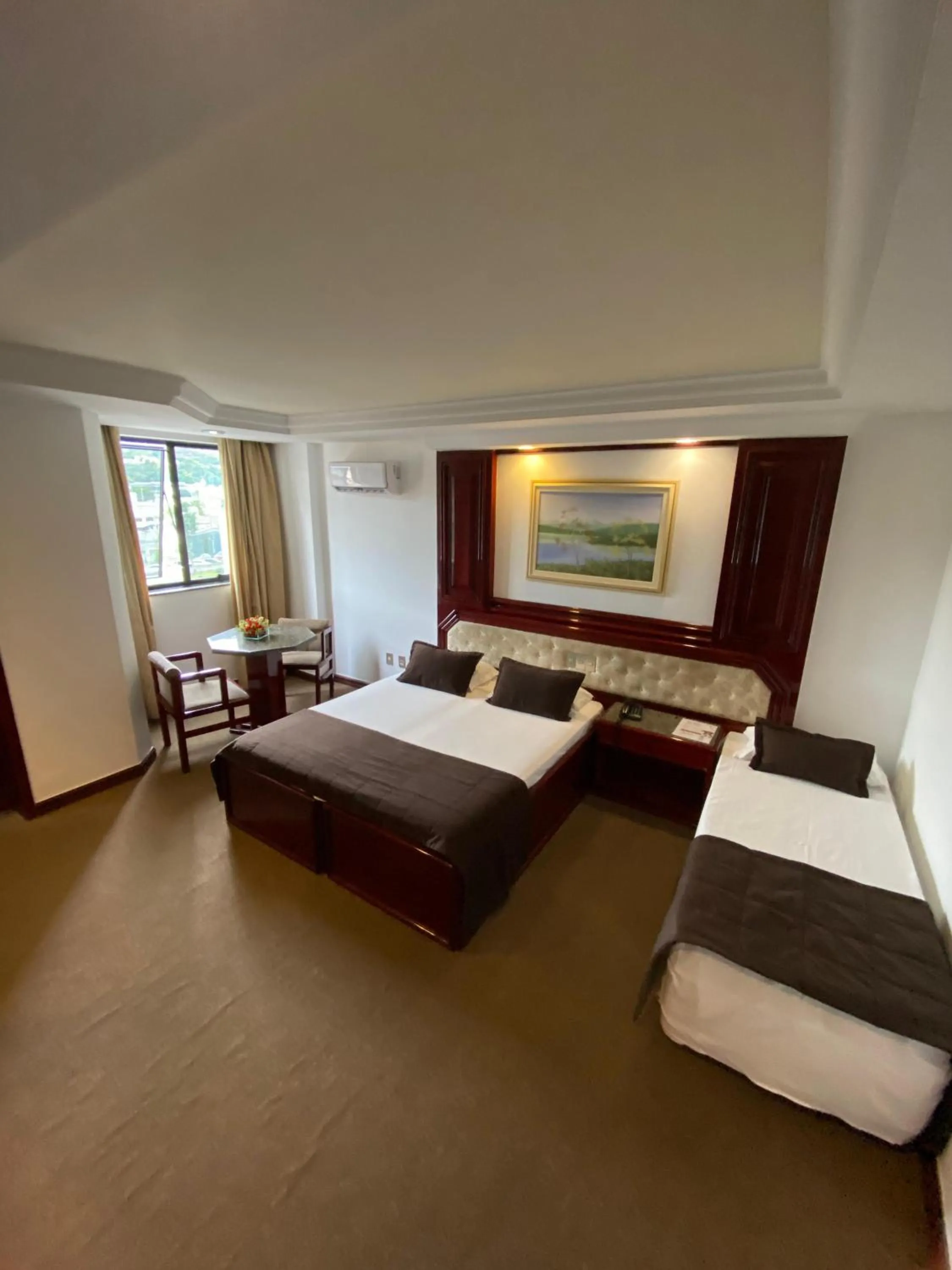 View (from property/room), Bed in Maxim Plaza Hotel