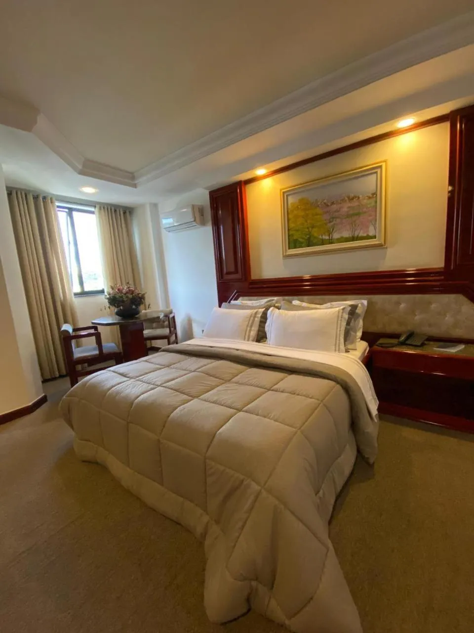 Bed in Maxim Plaza Hotel