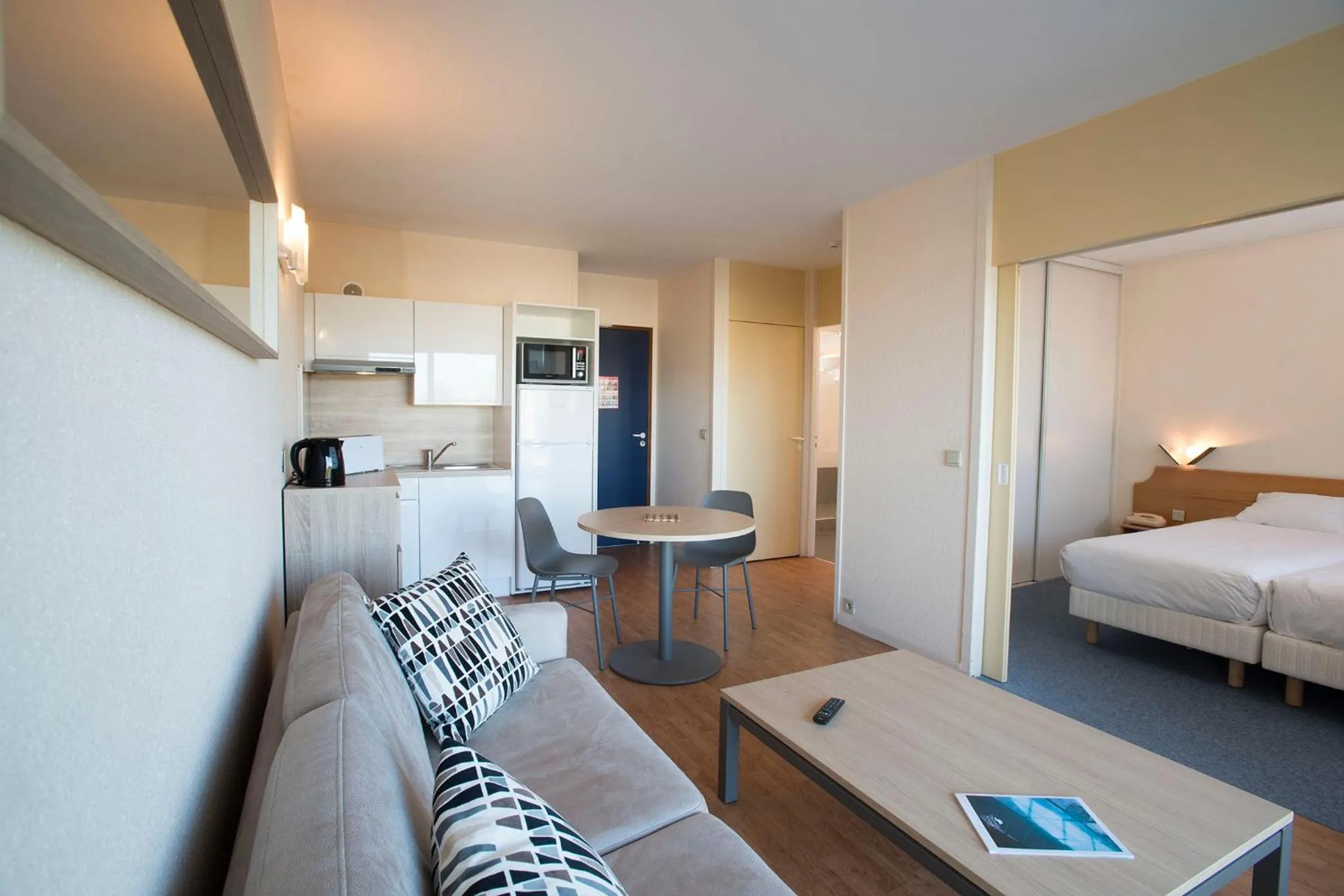 Living room, Bed in Residence Les Chenes