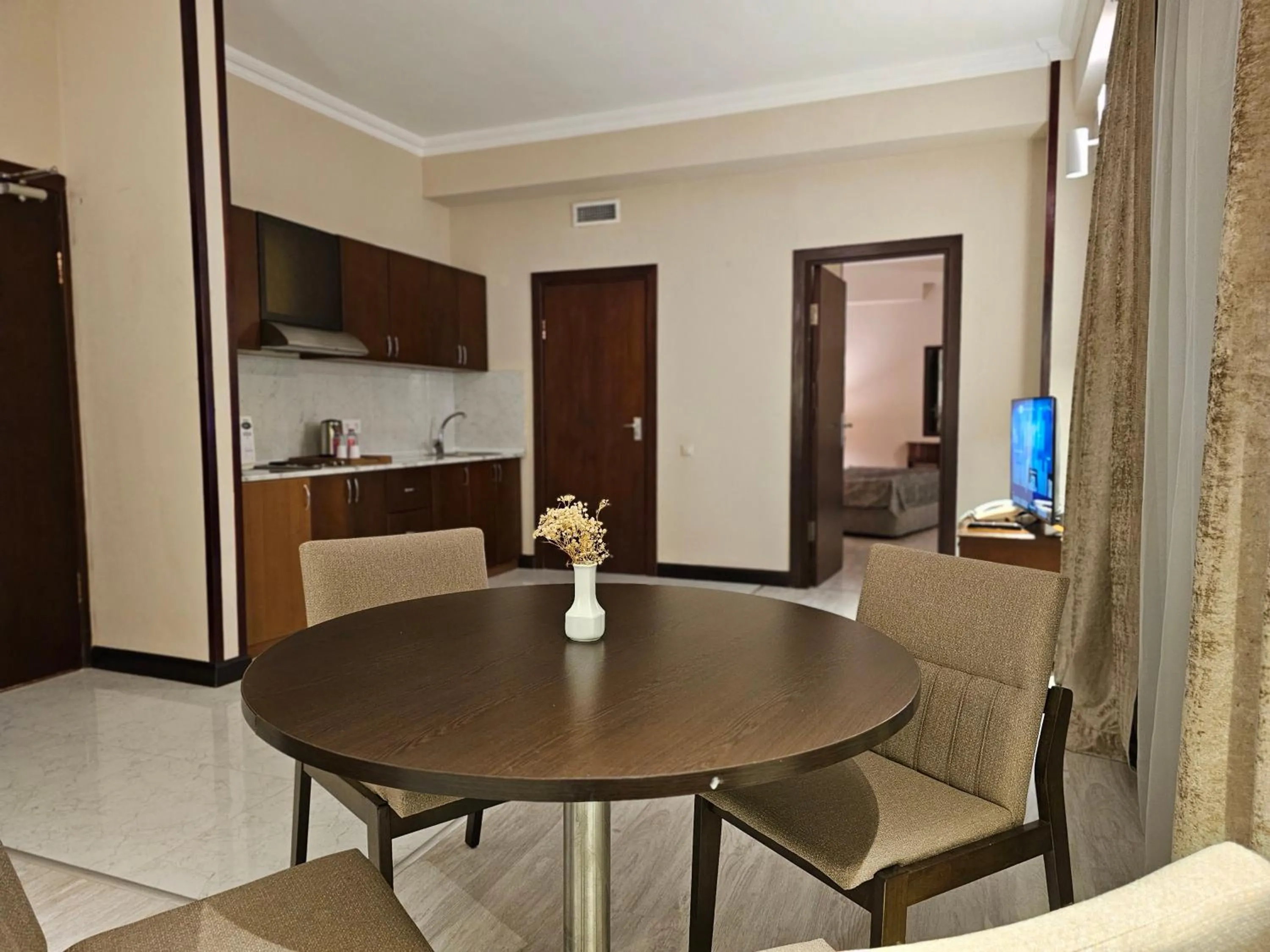 Kitchen or kitchenette in Crown Suites Hotel