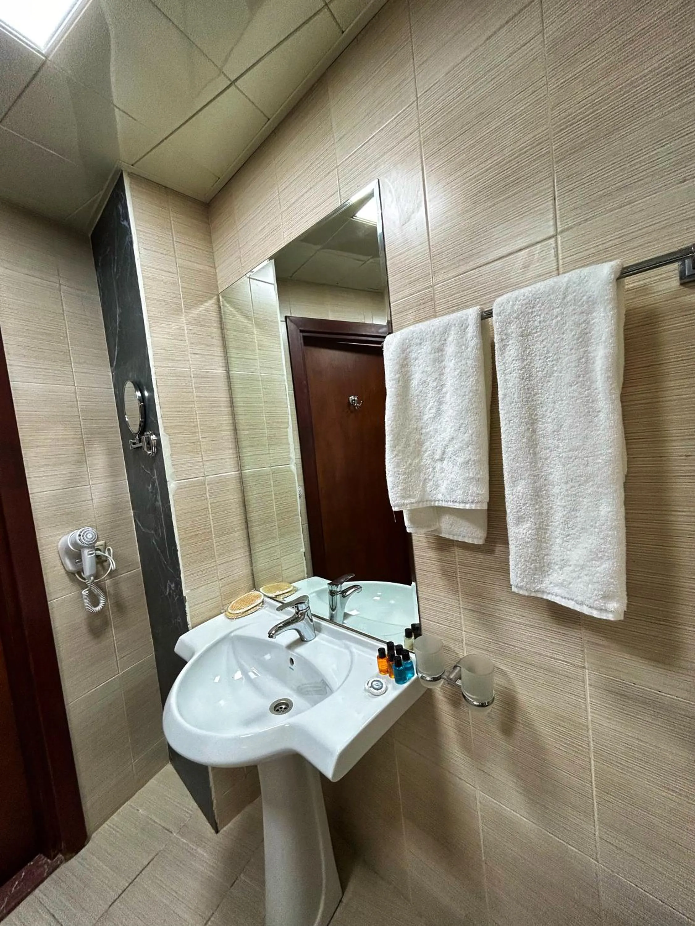 Shower in Crown Suites Hotel