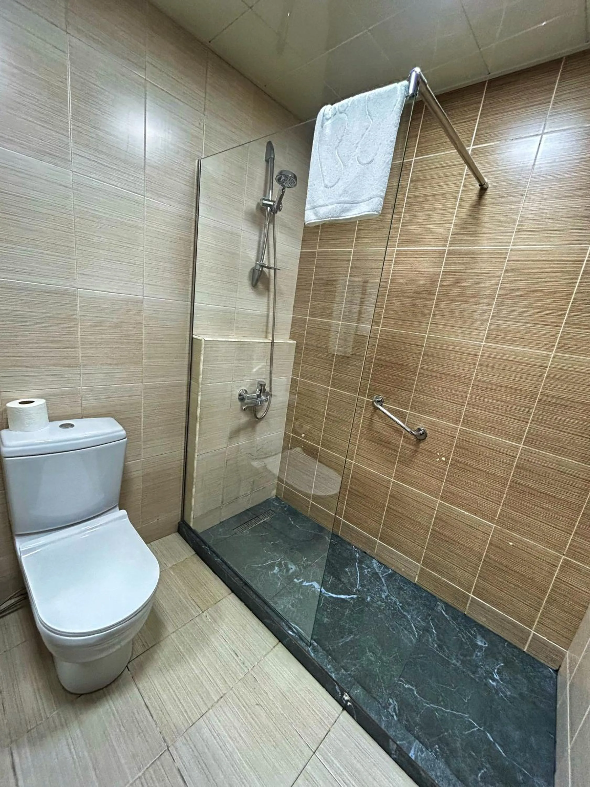 Shower in Crown Suites Hotel