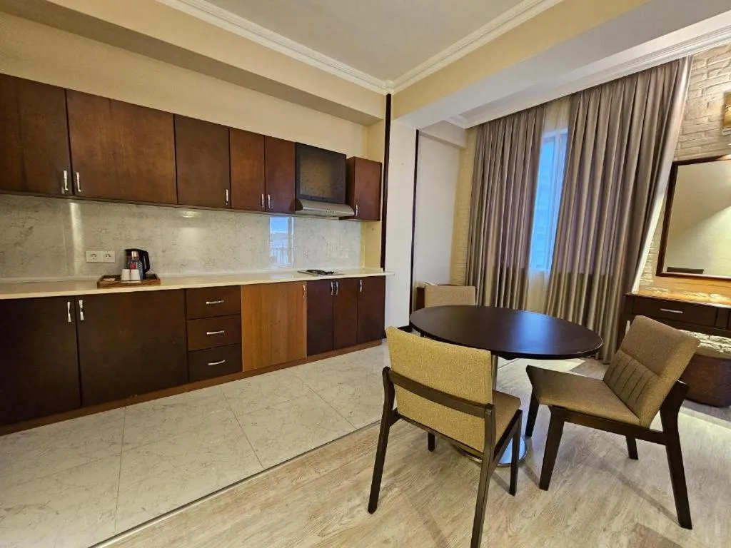 TV and multimedia in Crown Suites Hotel