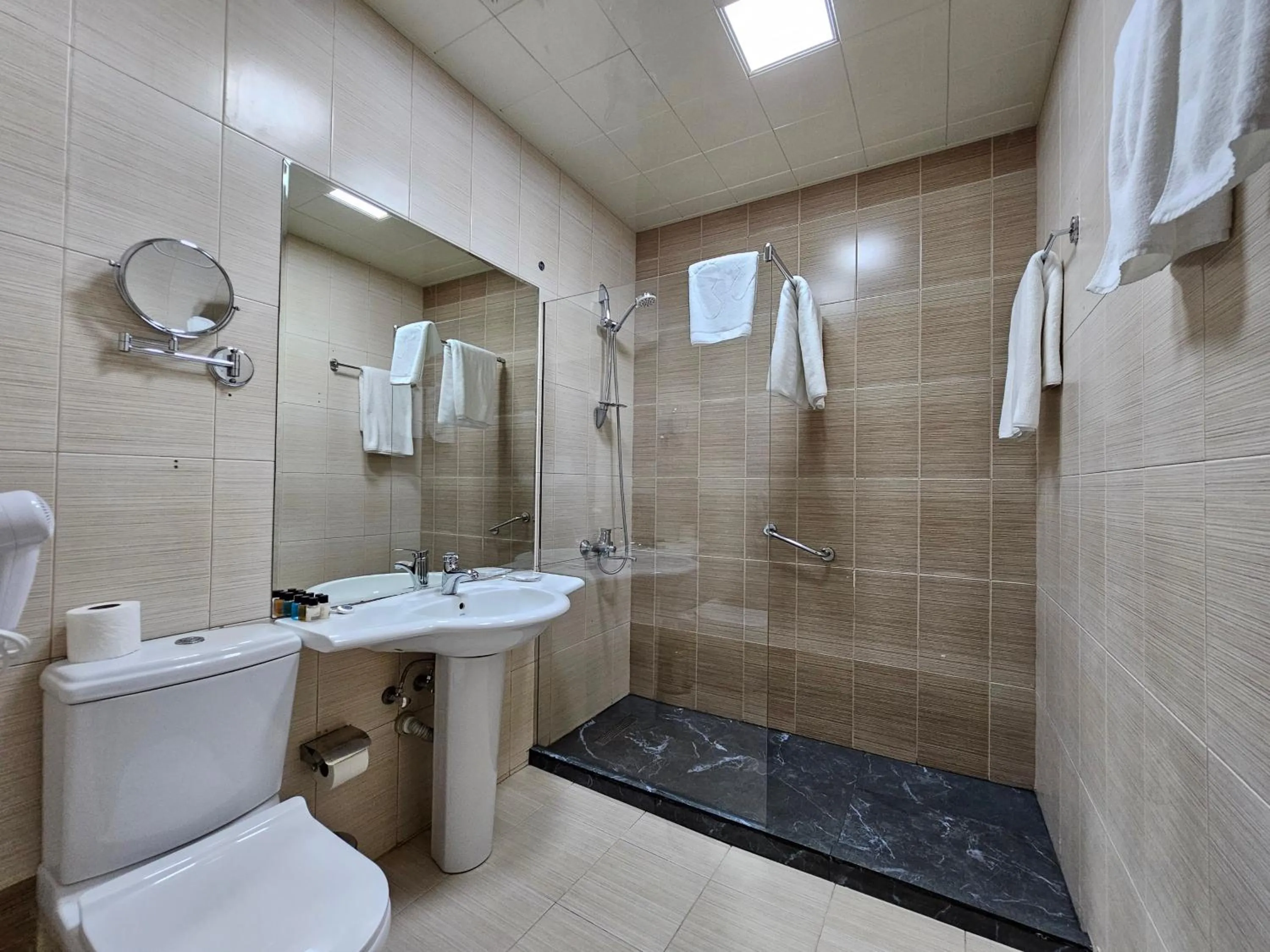 Shower in Crown Suites Hotel