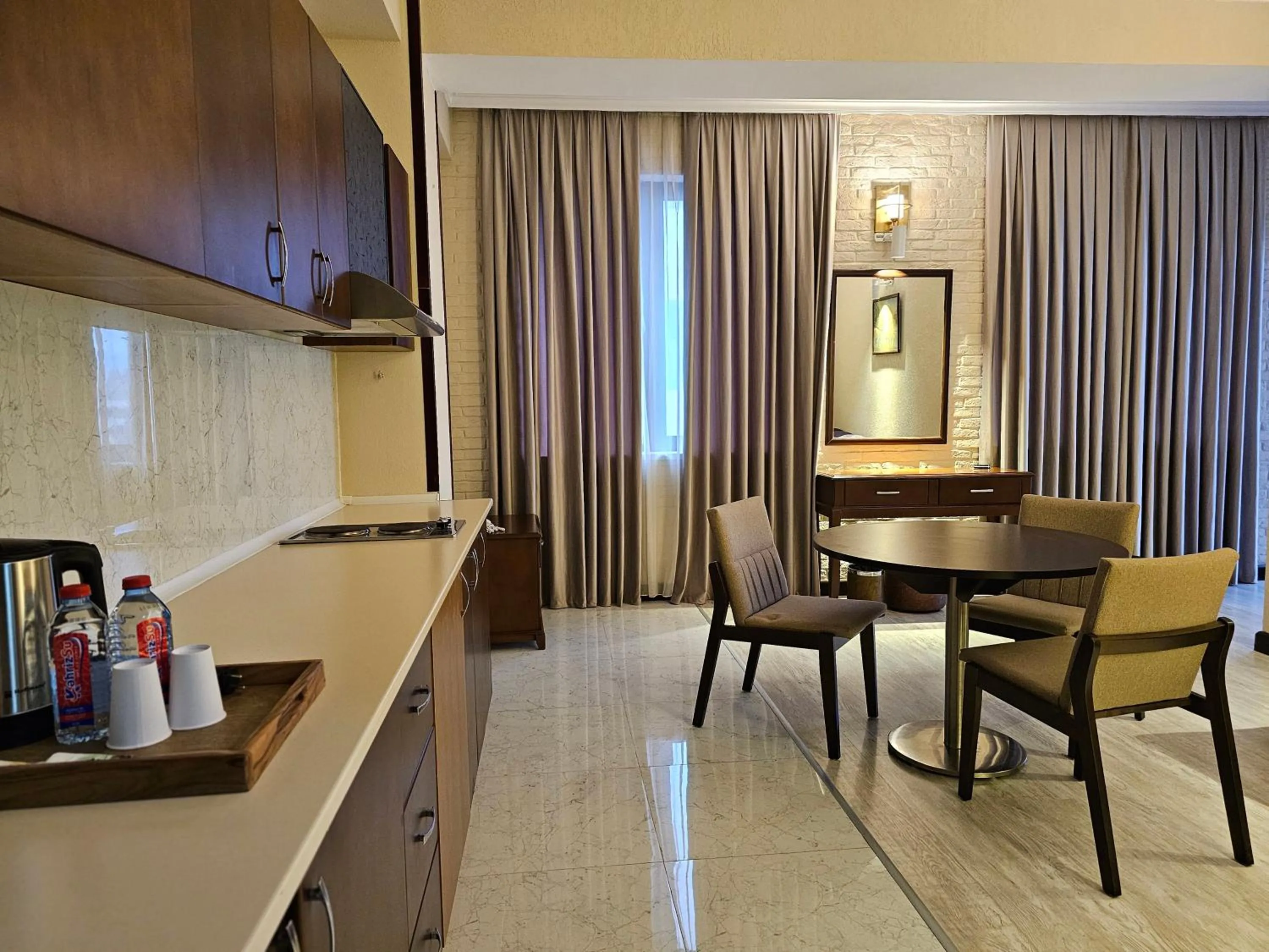 Kitchen or kitchenette in Crown Suites Hotel