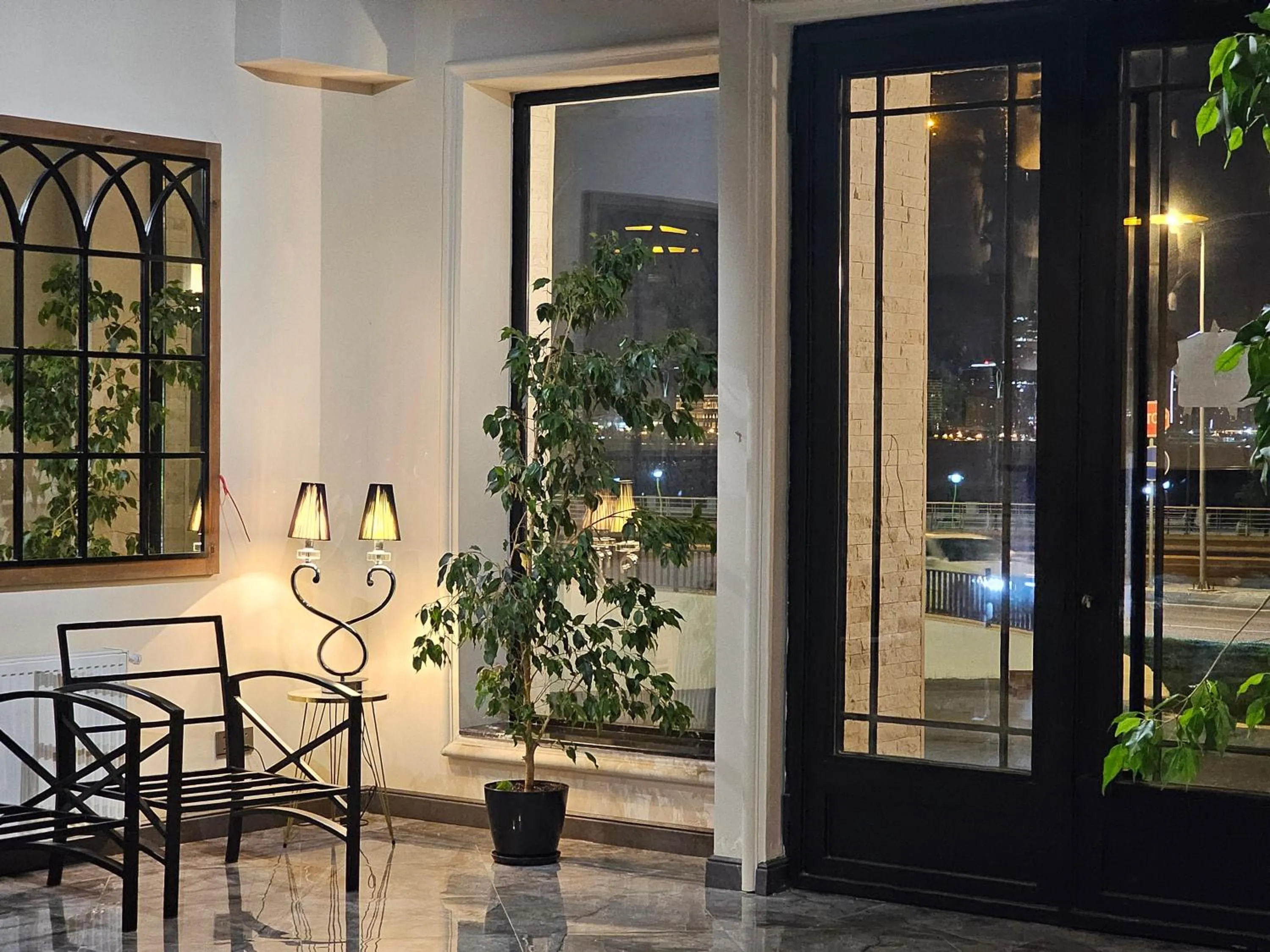 Lobby or reception in Crown Suites Hotel