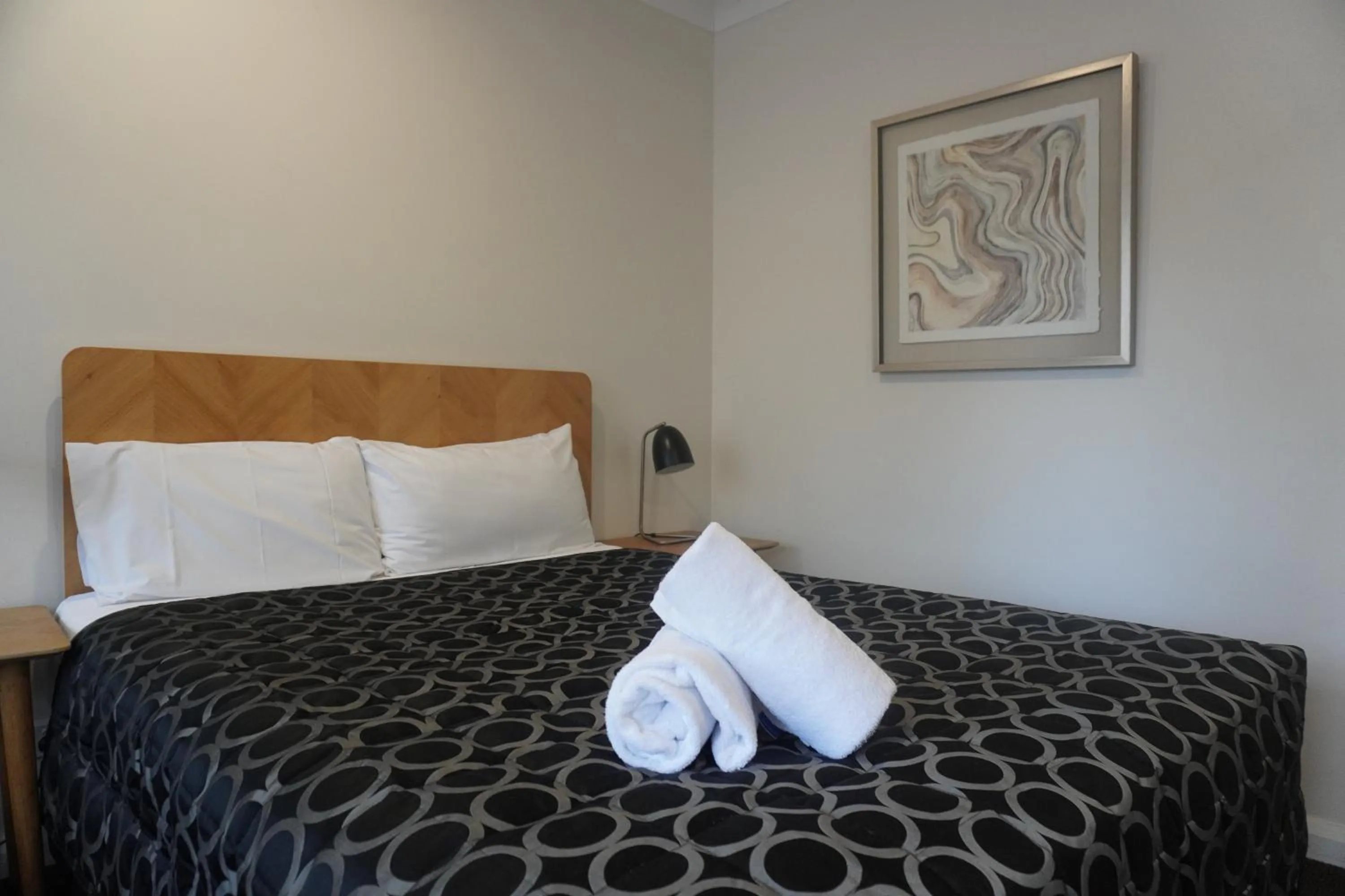 Bed in Wagga Gardens Motel