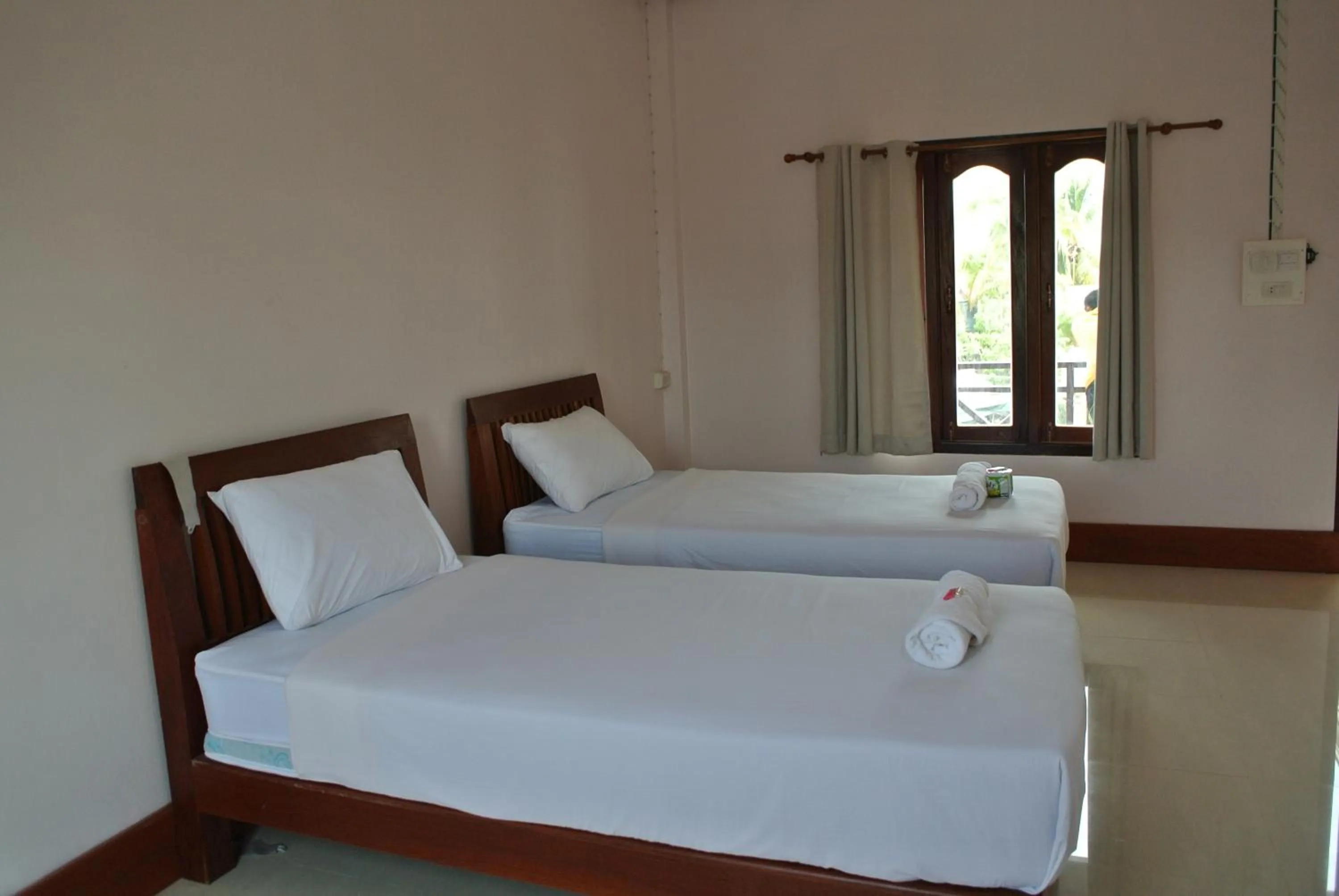 Bed in Mama Leurth Sunset Guesthouse