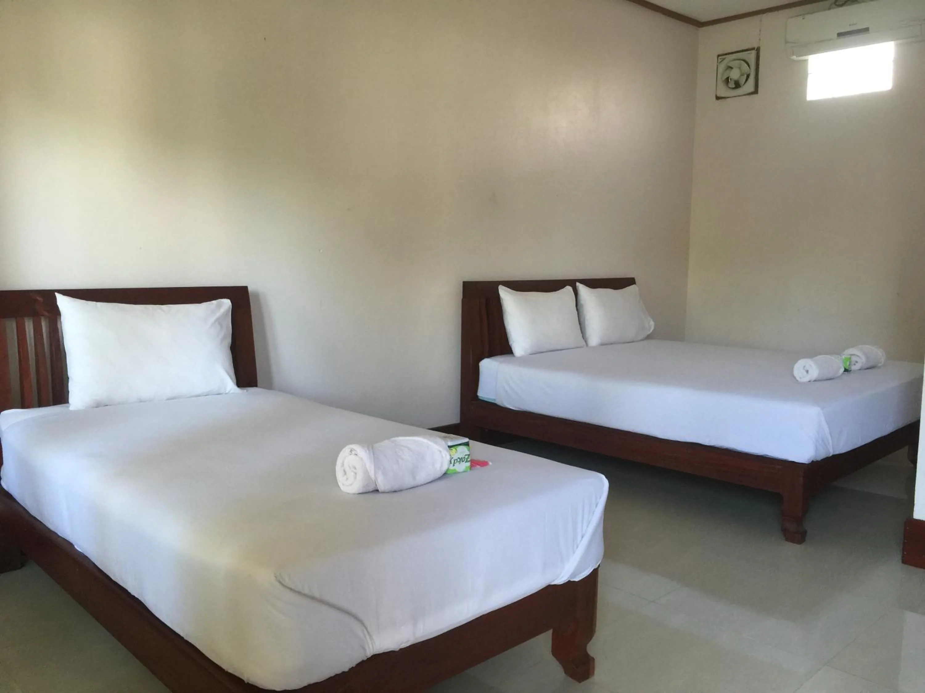 Bed in Mama Leurth Sunset Guesthouse