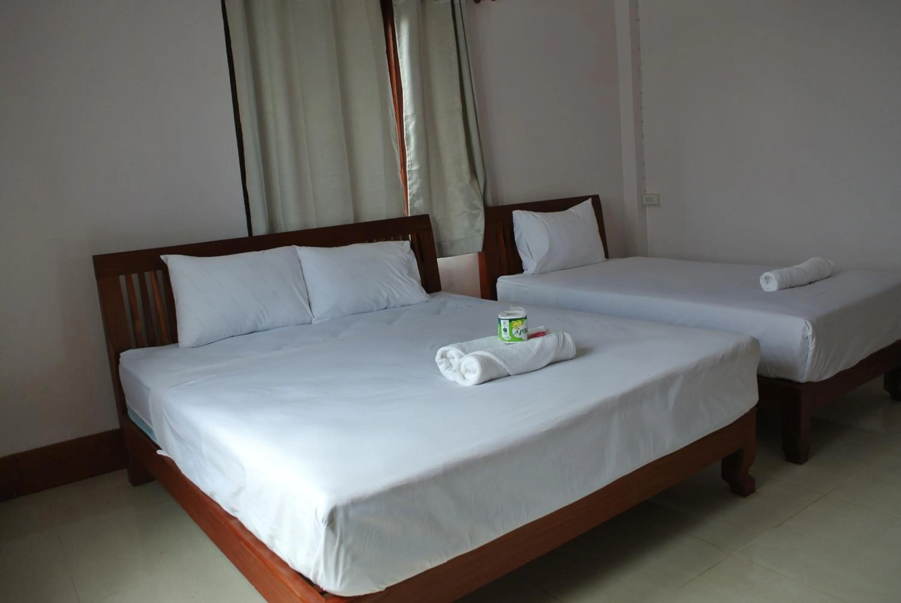 Bed in Mama Leurth Sunset Guesthouse