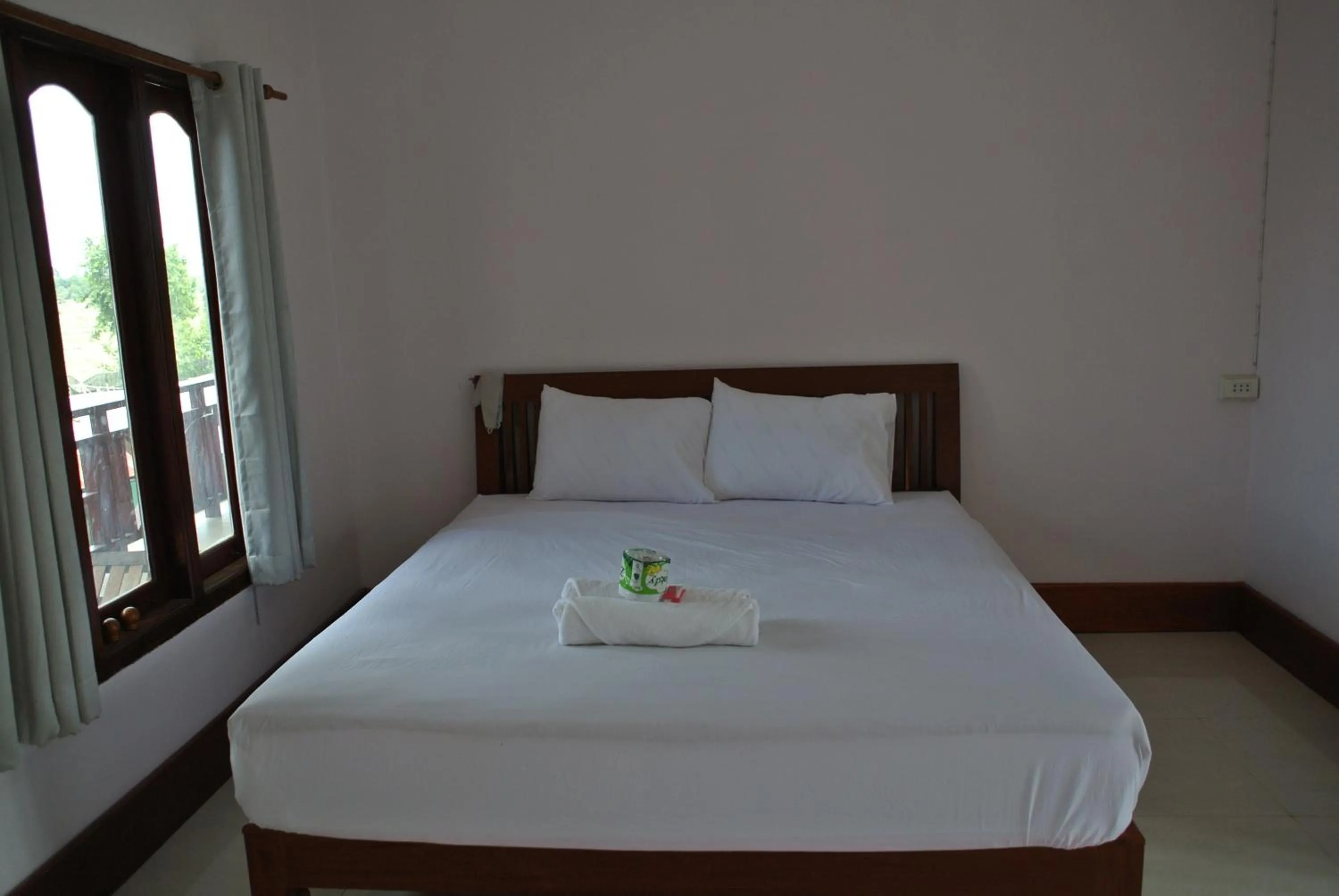 Bed in Mama Leurth Sunset Guesthouse