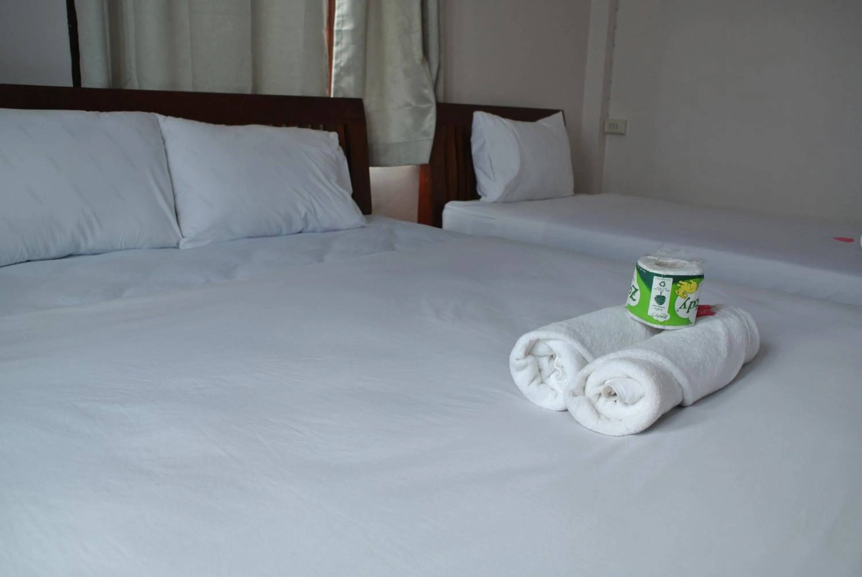 Bed in Mama Leurth Sunset Guesthouse