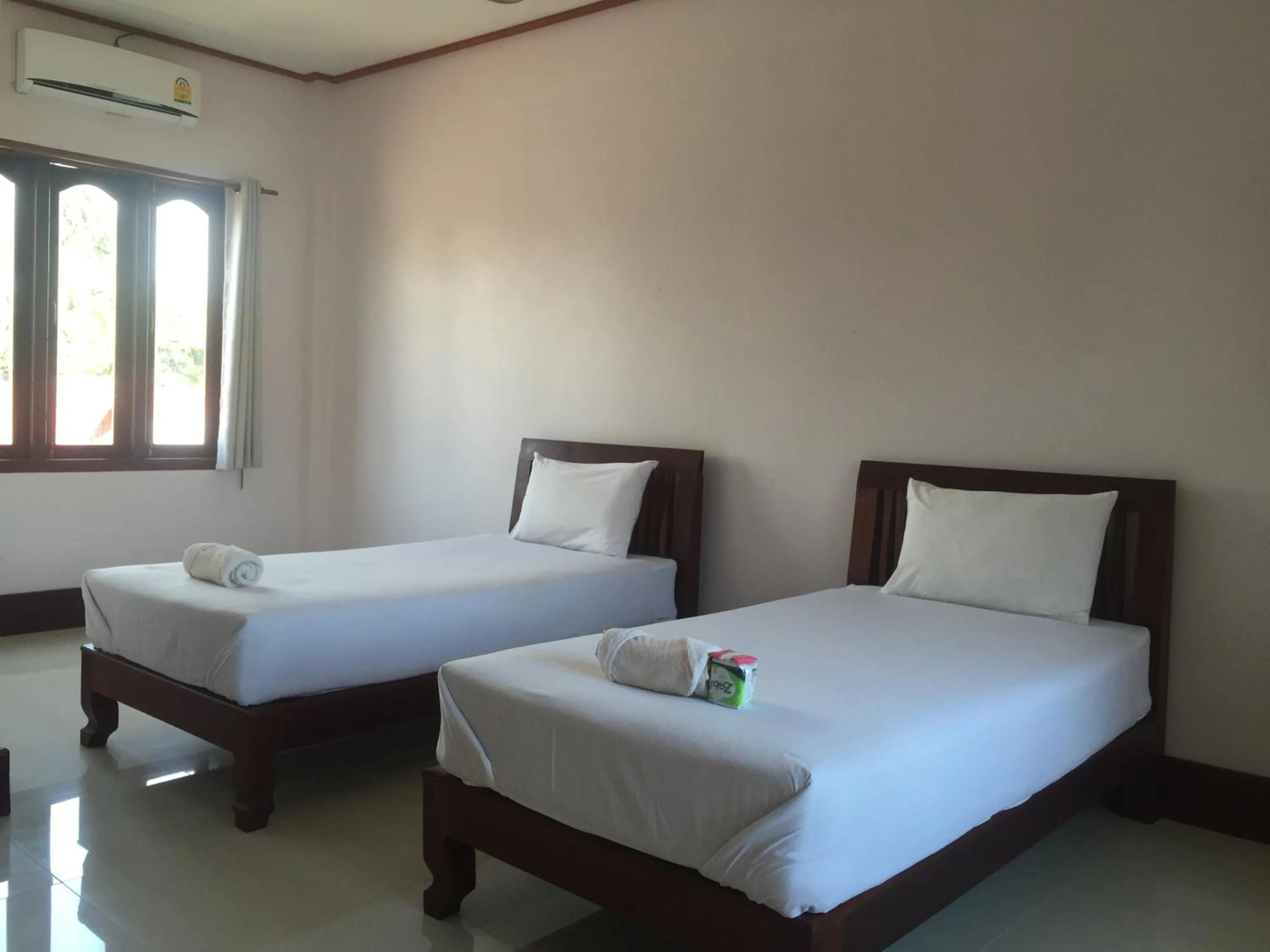 Bed in Mama Leurth Sunset Guesthouse