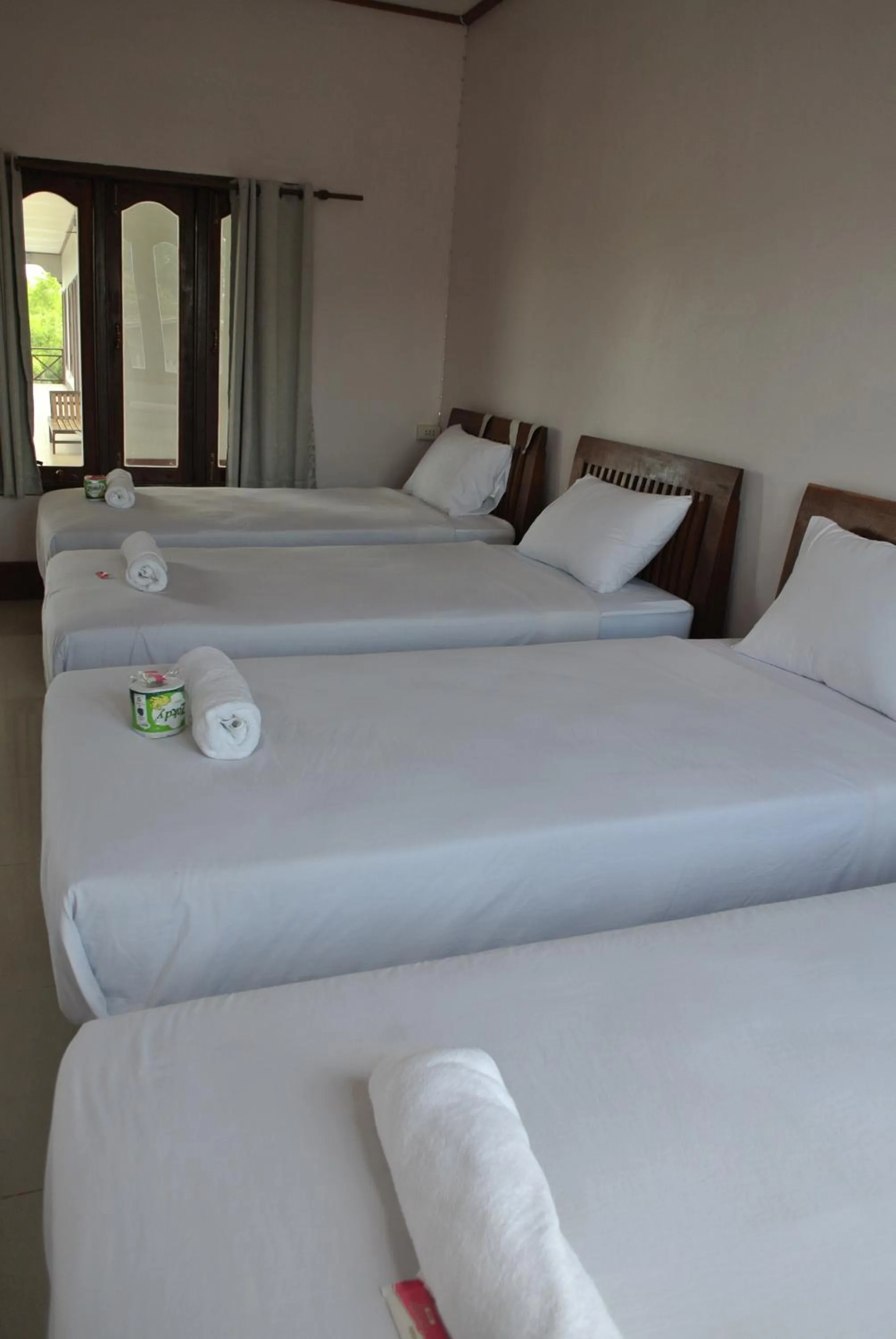 Bed in Mama Leurth Sunset Guesthouse