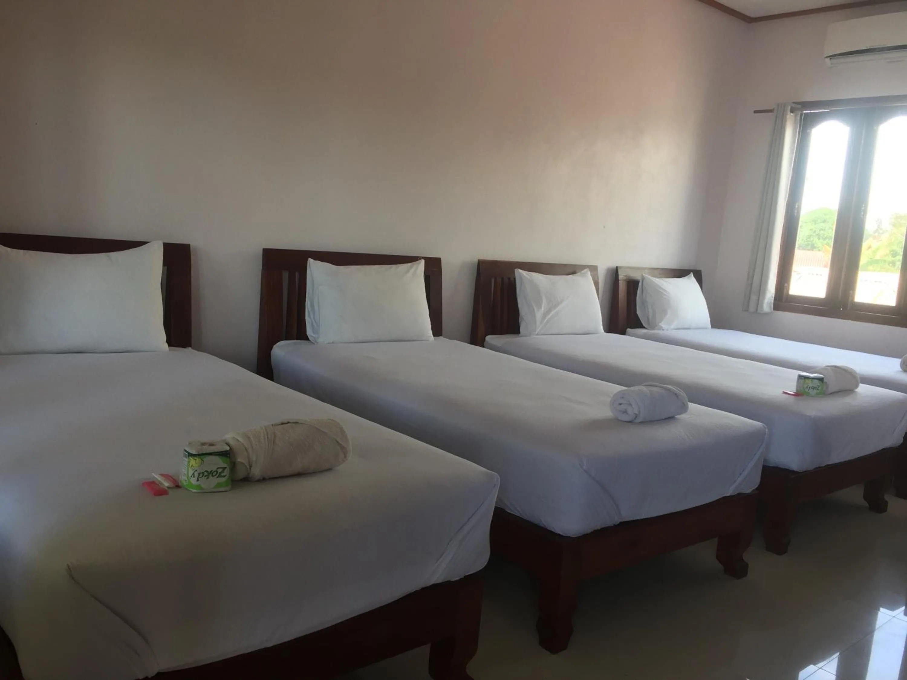 Bed in Mama Leurth Sunset Guesthouse