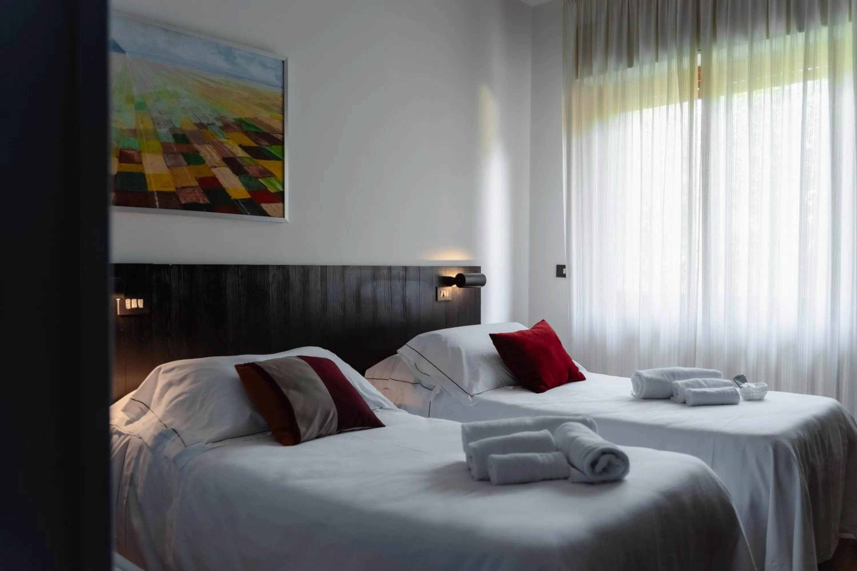 Bed in Mami Sabaudia Hotel