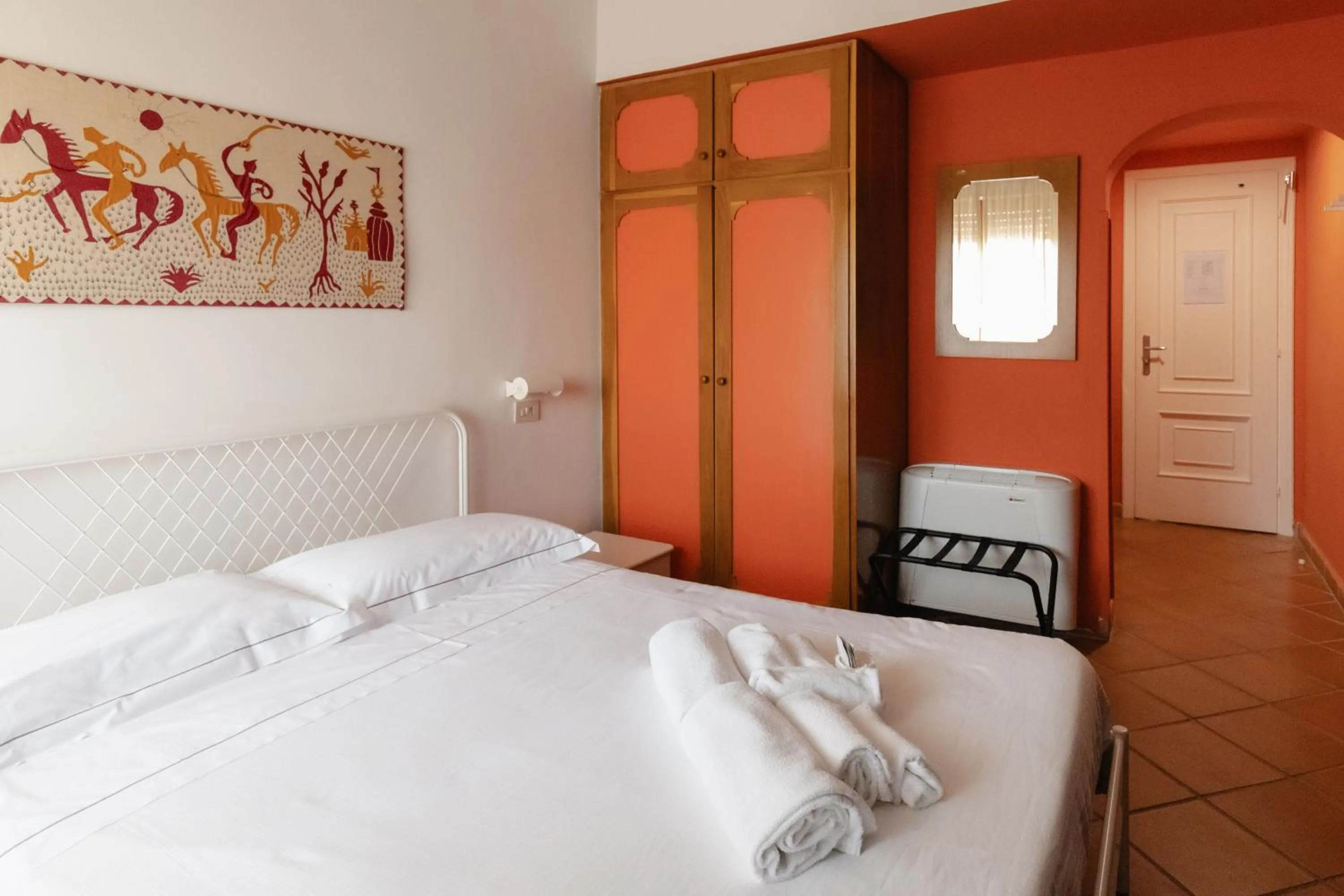 Bed in Mami Sabaudia Hotel