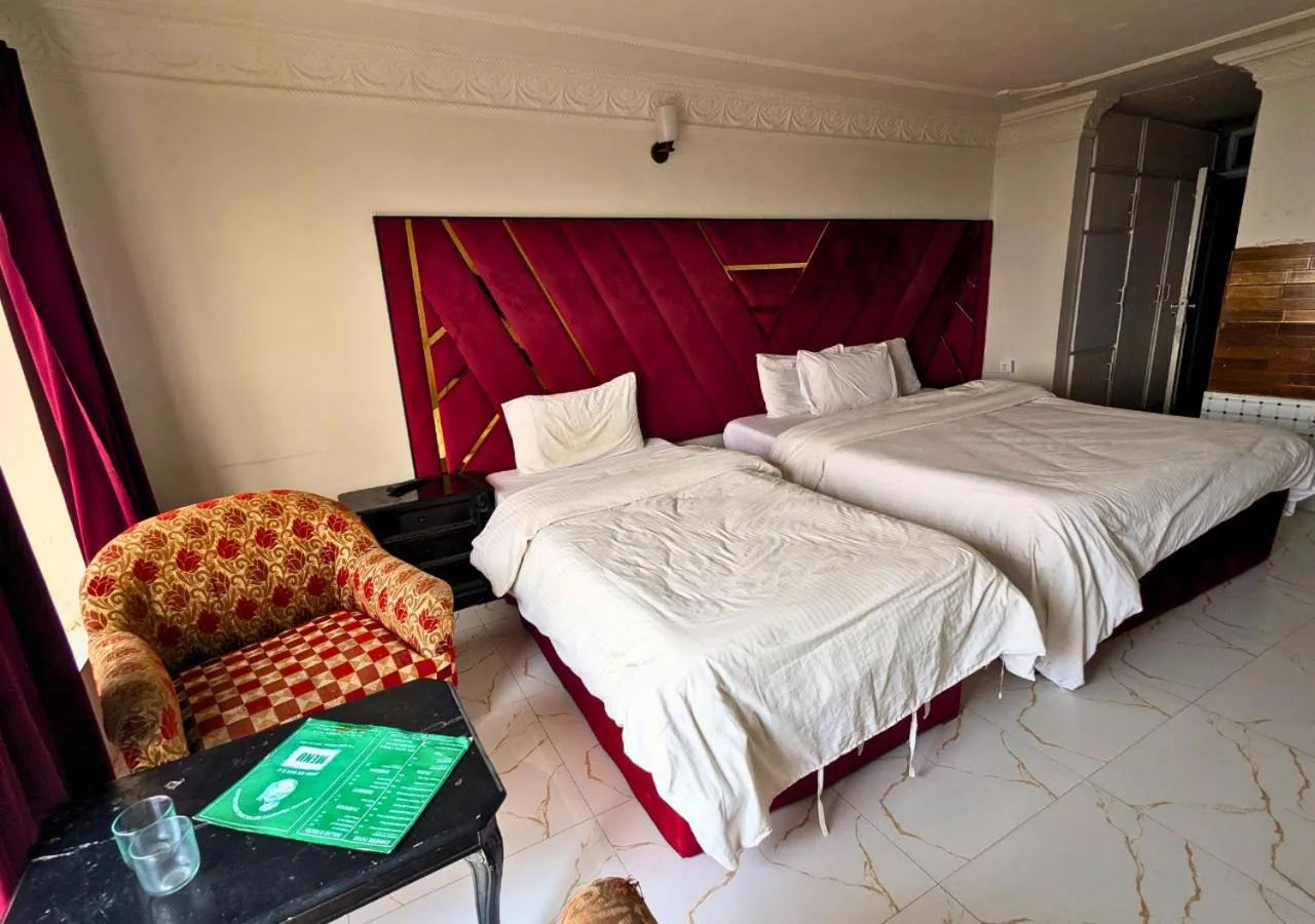 Bed in Grand Heights Hotel
