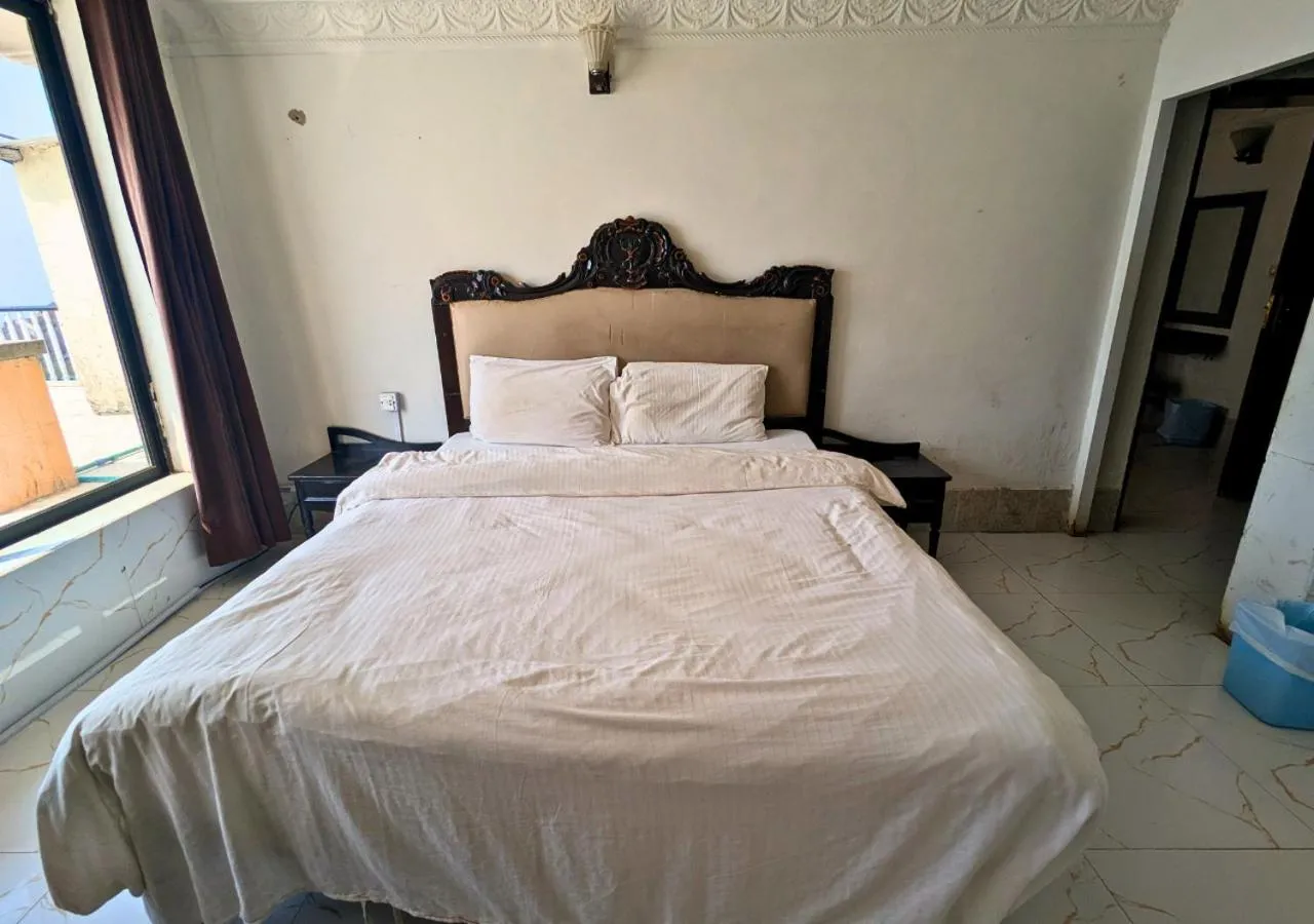 Bed in Grand Heights Hotel