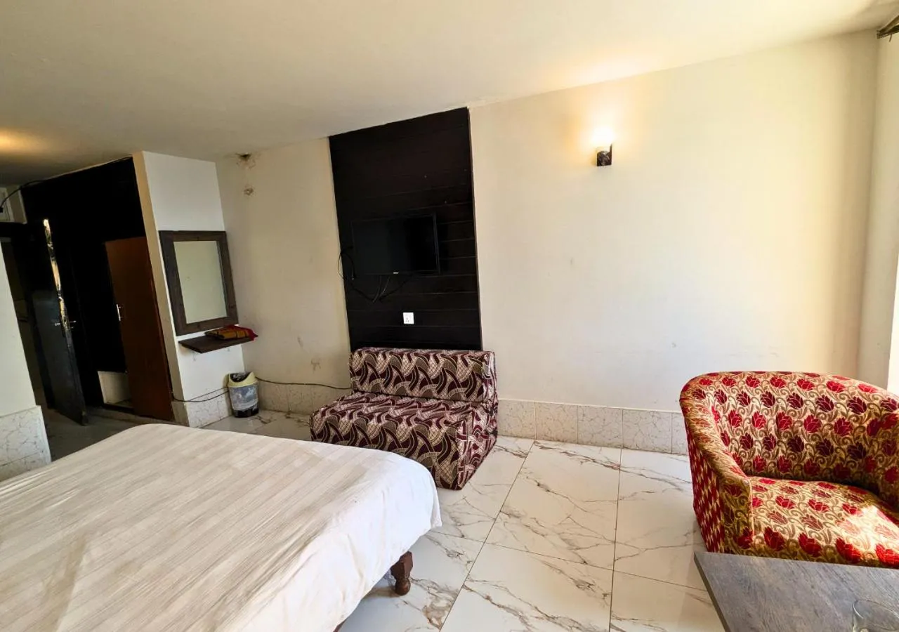 Bed in Grand Heights Hotel